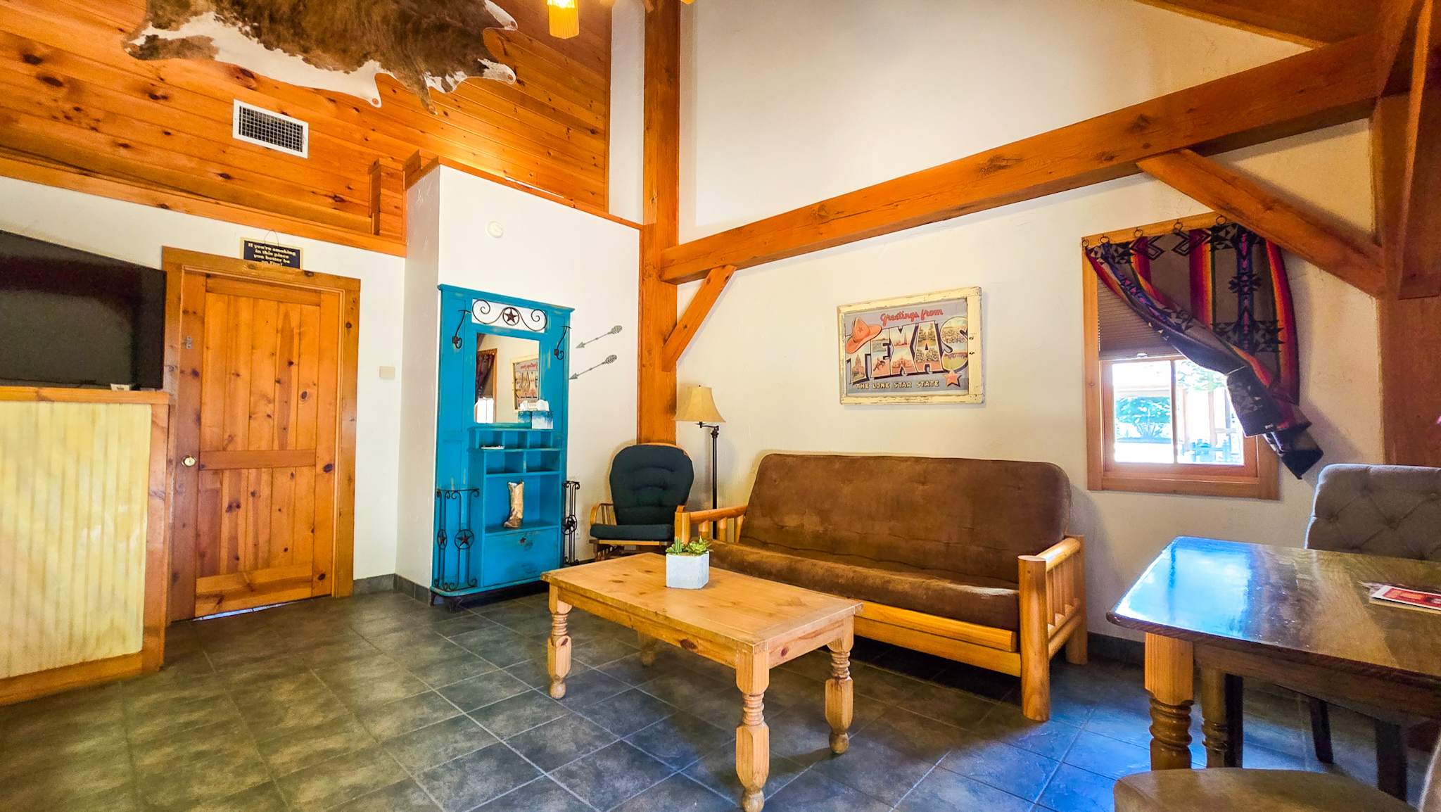Curl up on the full-size futon & enjoy a movie night in the living room​