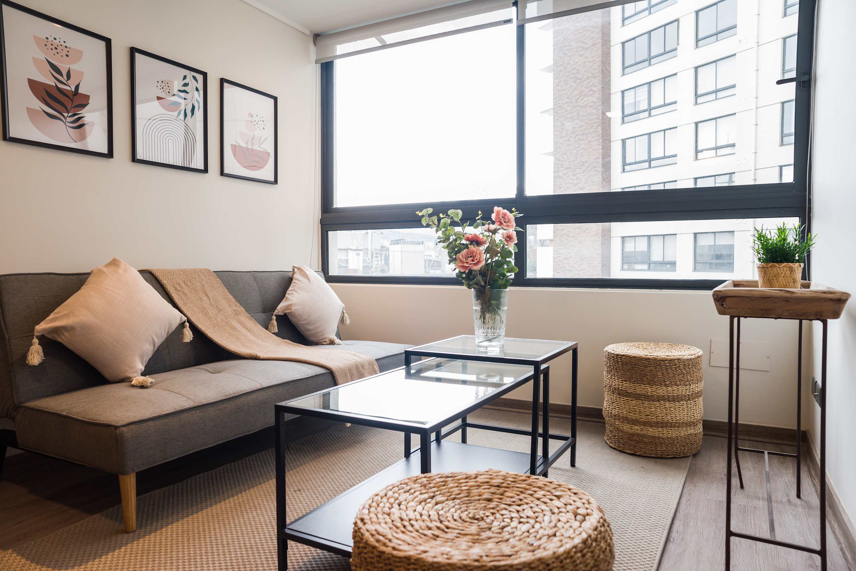 Relax in this cozy living space with stylish decor and ample natural light, perfect for unwinding after a day of exploring.