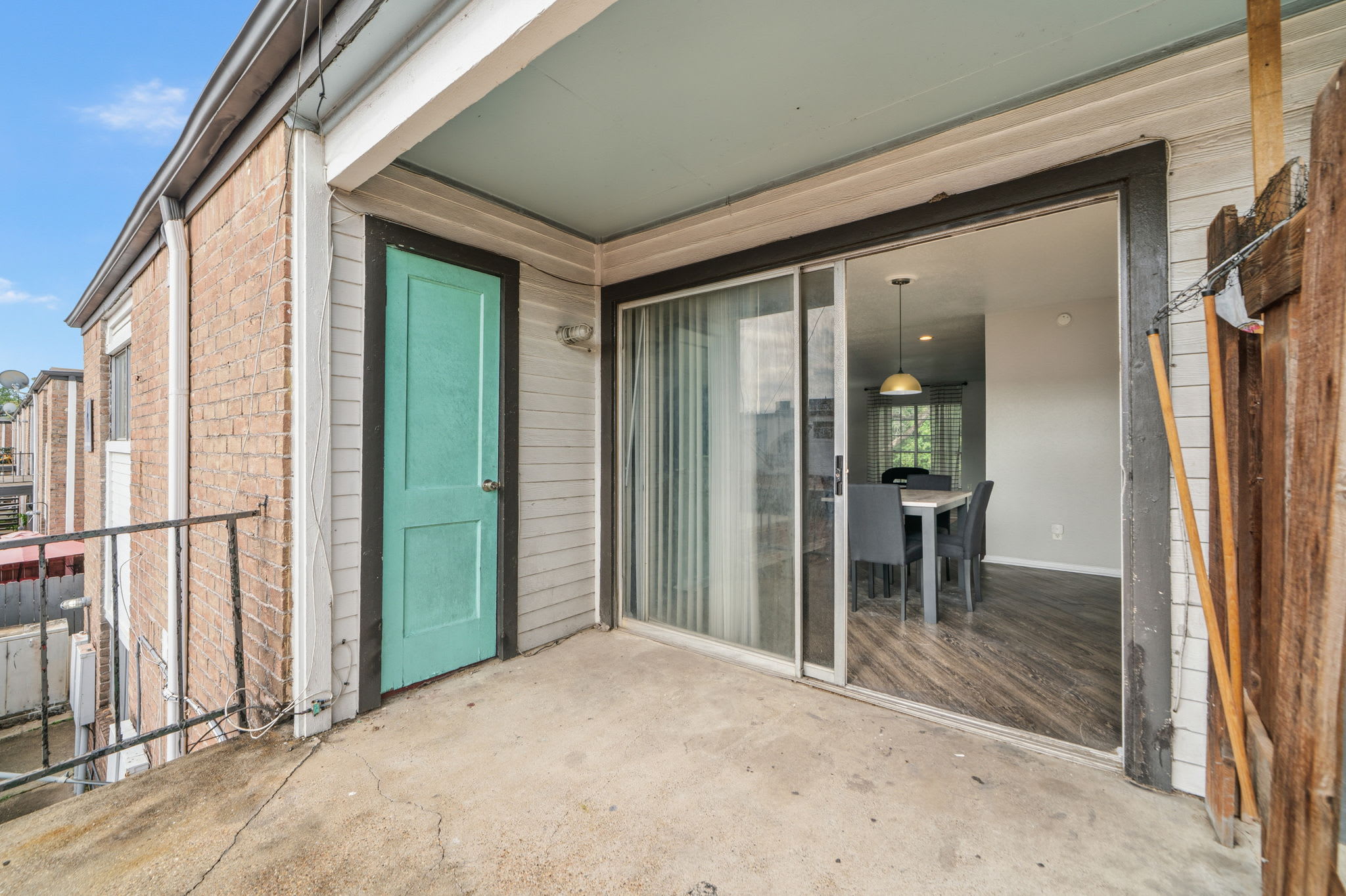 Enjoy a cozy outdoor patio with easy access to the dining area, perfect for morning coffee or evening relaxation.