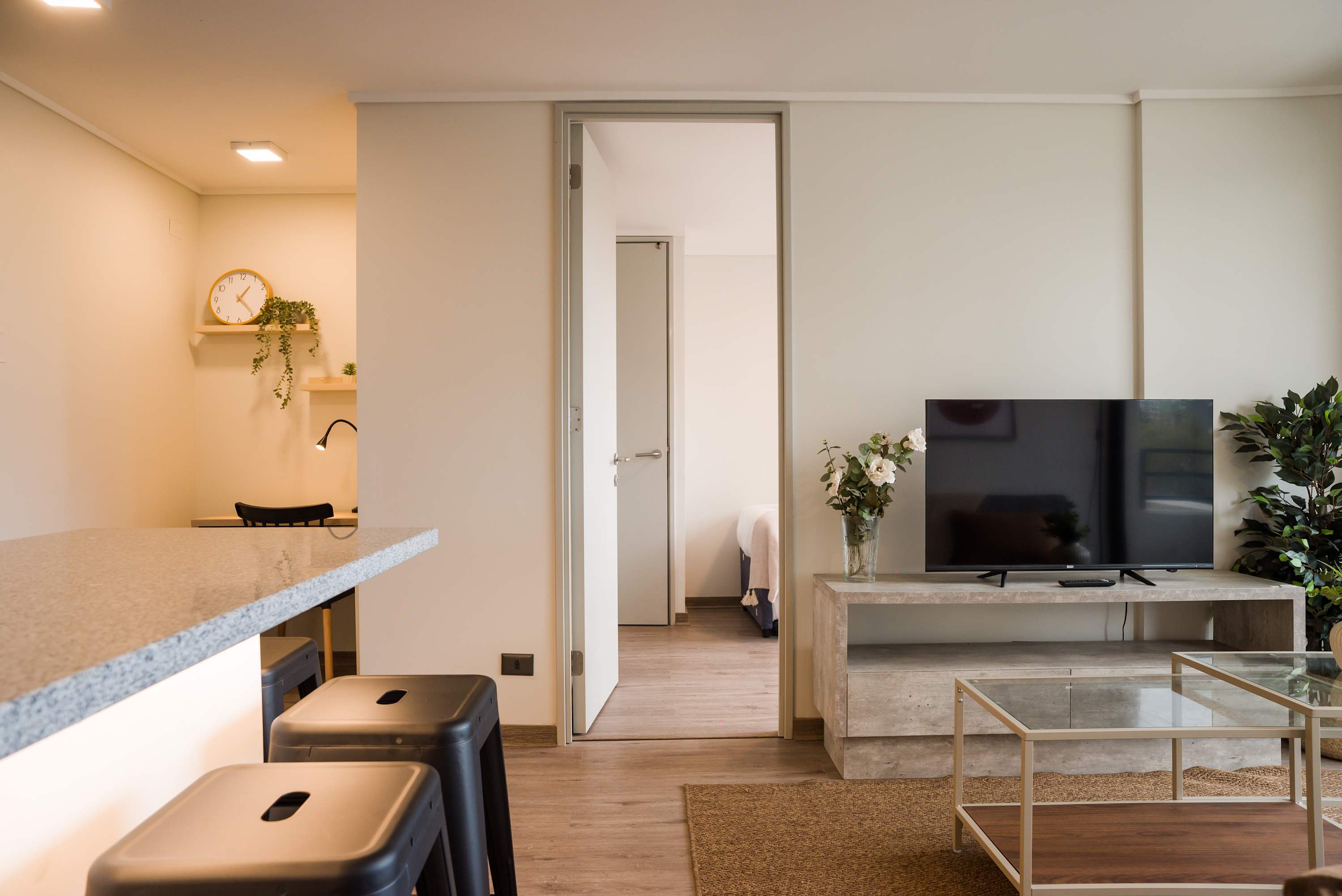Cozy living area with modern decor and a spacious layout, perfect for relaxation and entertainment.