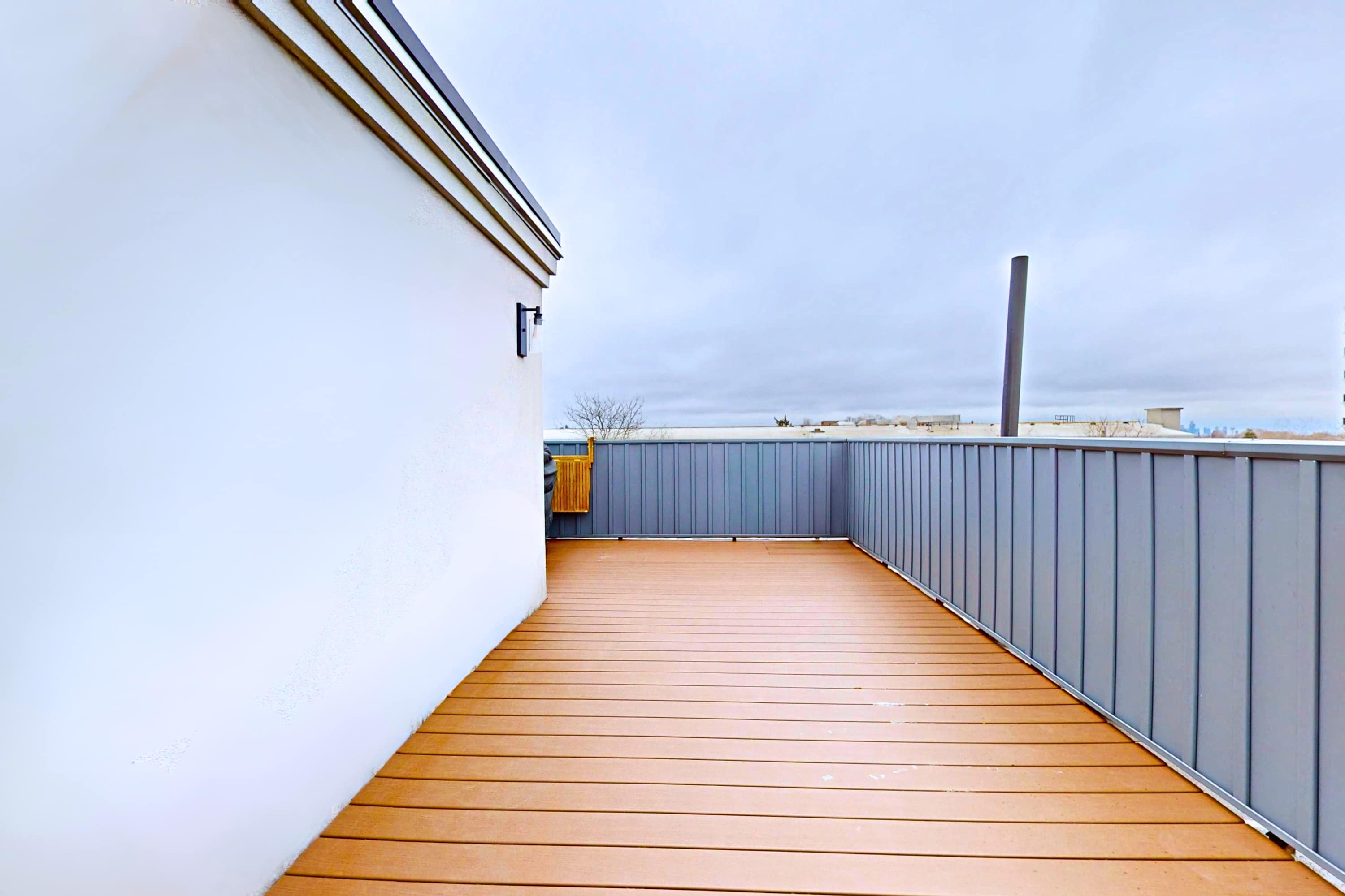 Step outside to your private rooftop oasis. Perfect for sunny days!