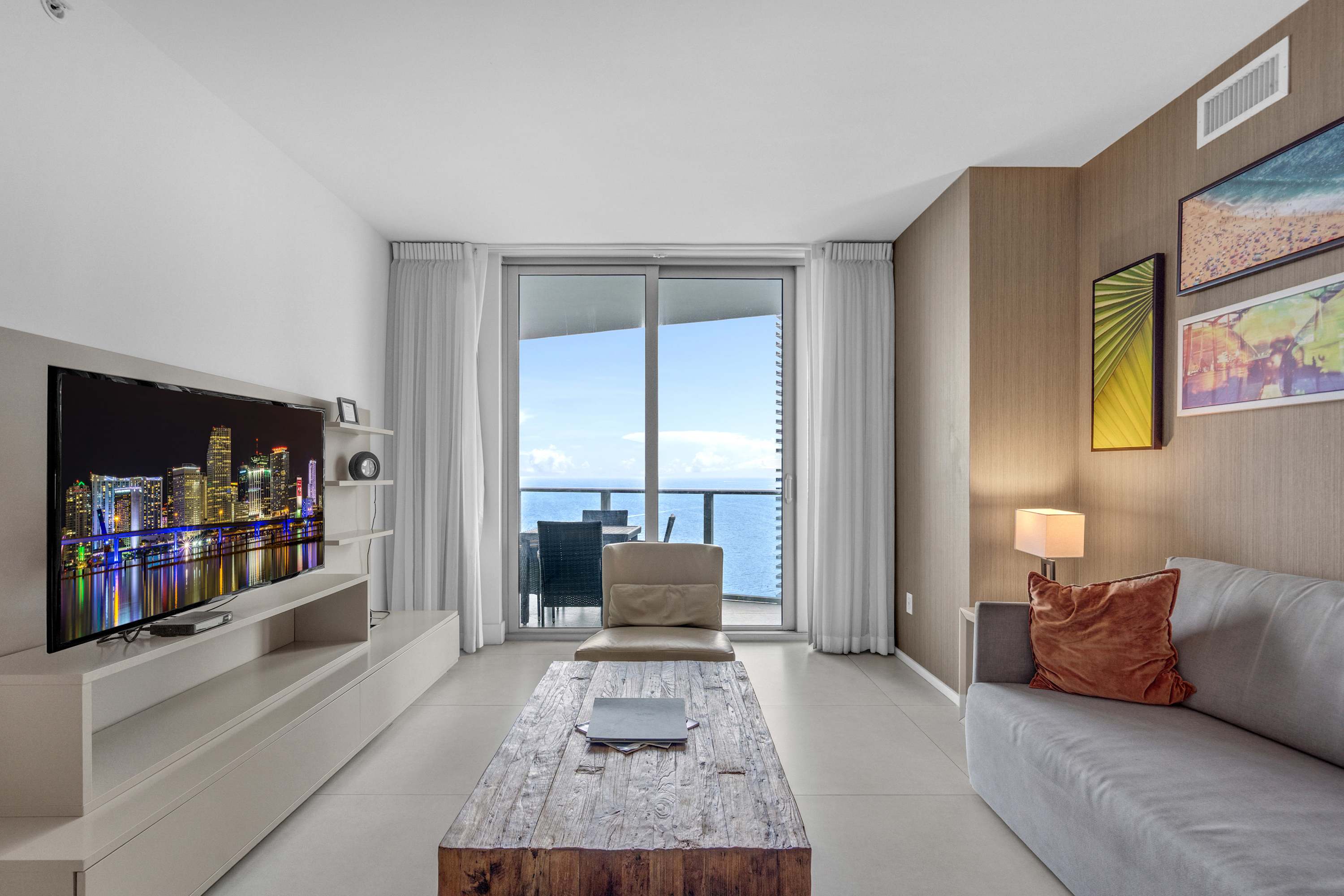 Unwind in the airy living room & stream your favorites on the smart TV​