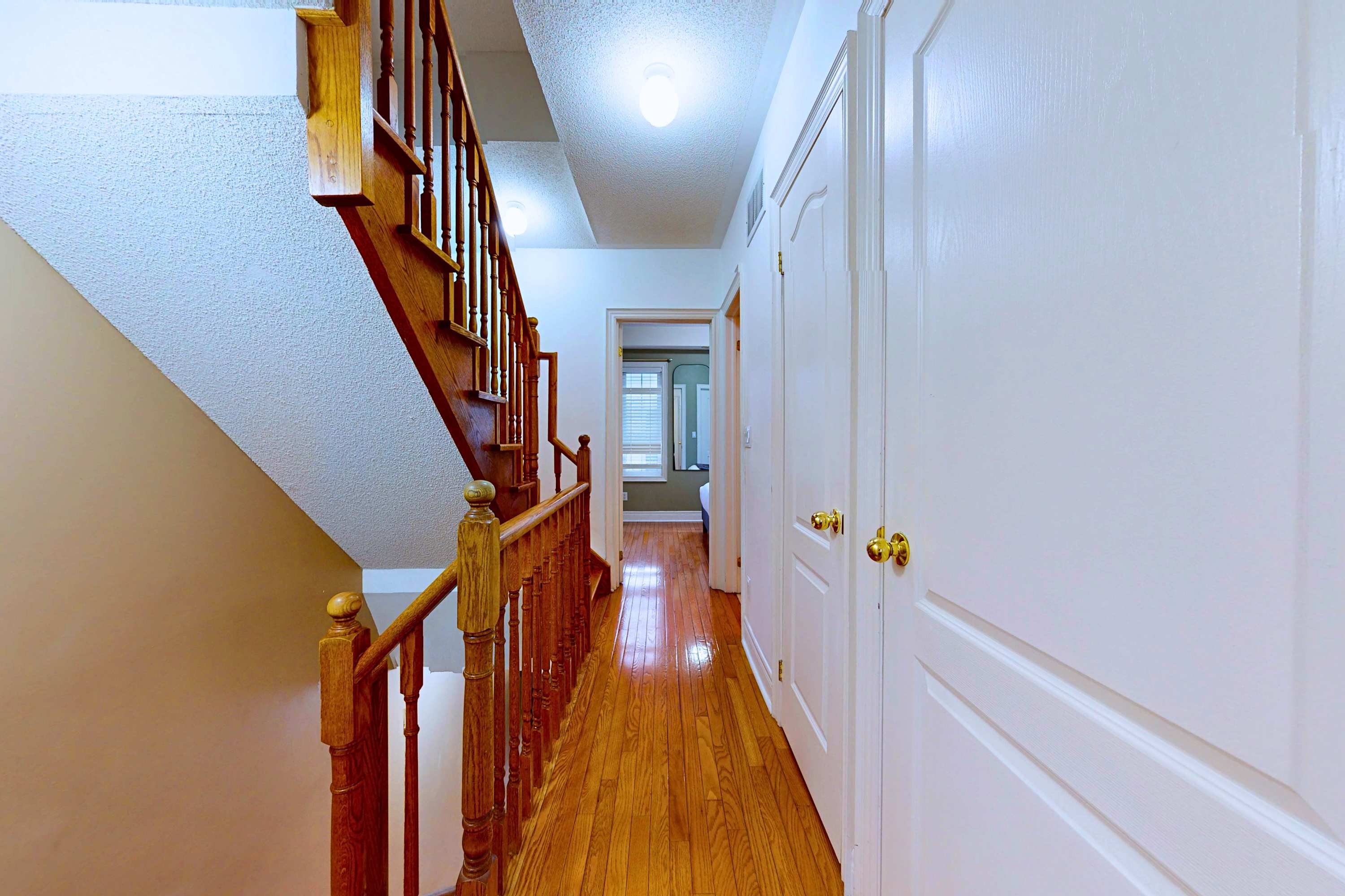 Staircase and Hallway leading the bedrooms 