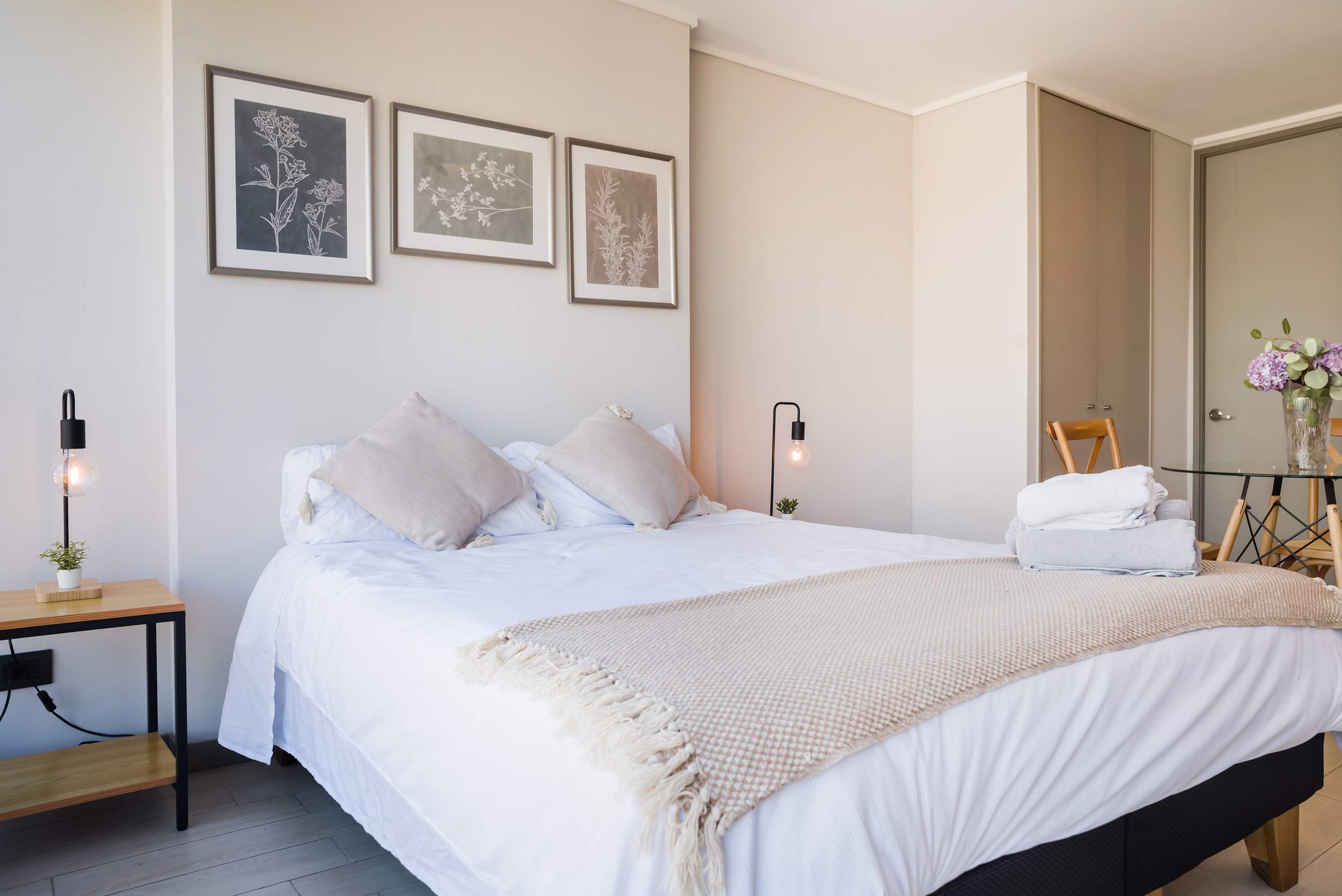 Relax in this cozy, sunlit studio with modern decor and thoughtful touches, perfect for a restful stay in the heart of Chile.