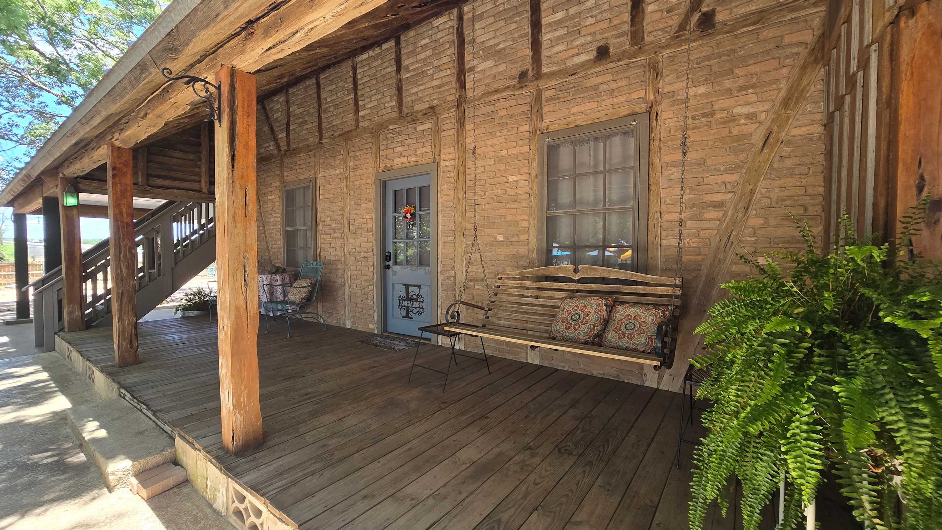 Sip morning coffee or an evening cocktail on the front porch​