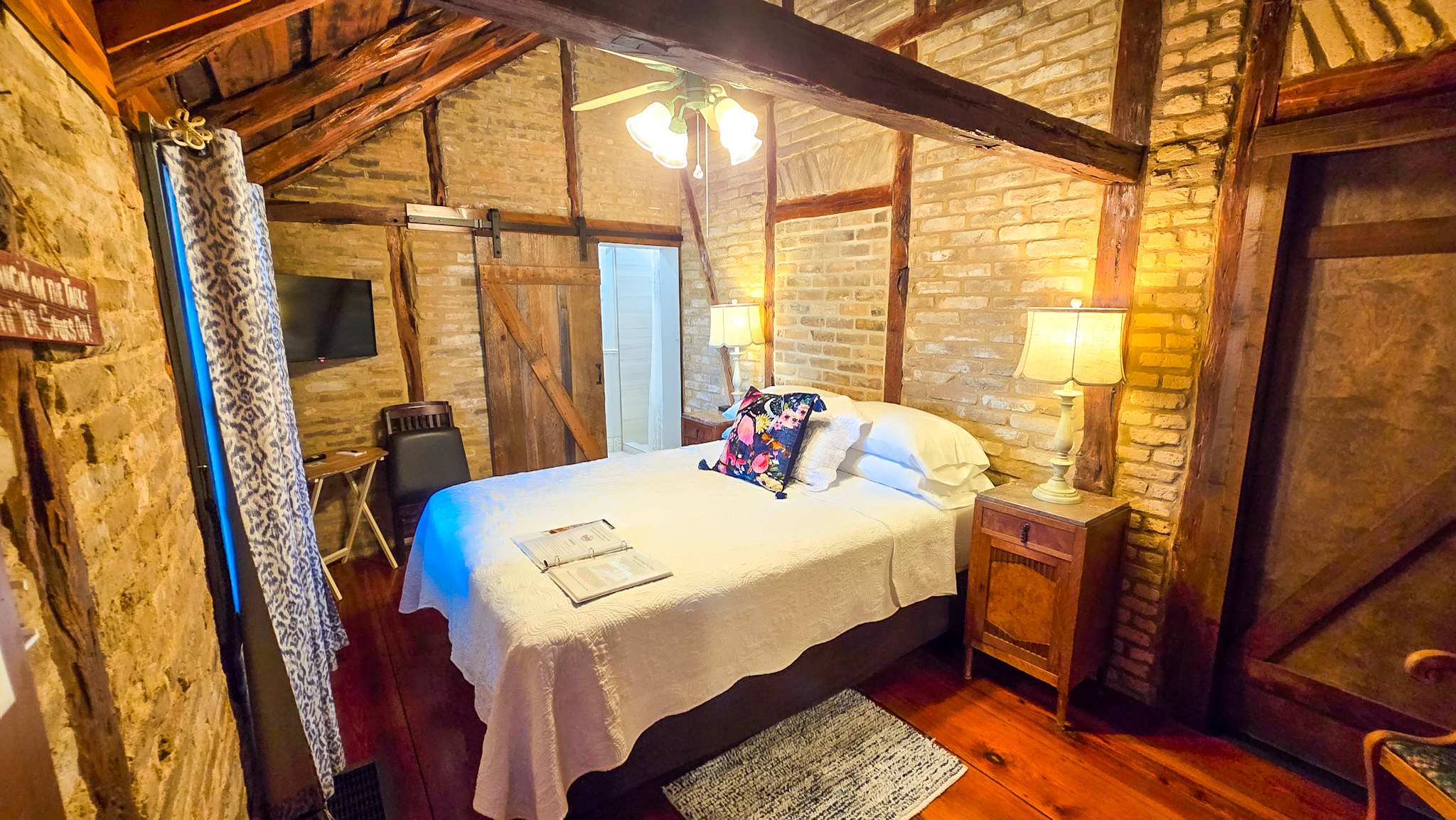 This cozy studio offers a queen bed, smart TV, kitchen, & full bath​