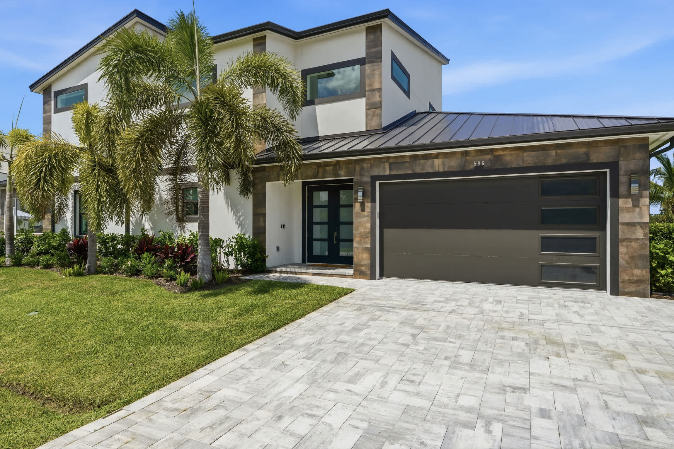 Brand New Luxury Pool Home Steps from the Gulf | Photo 53