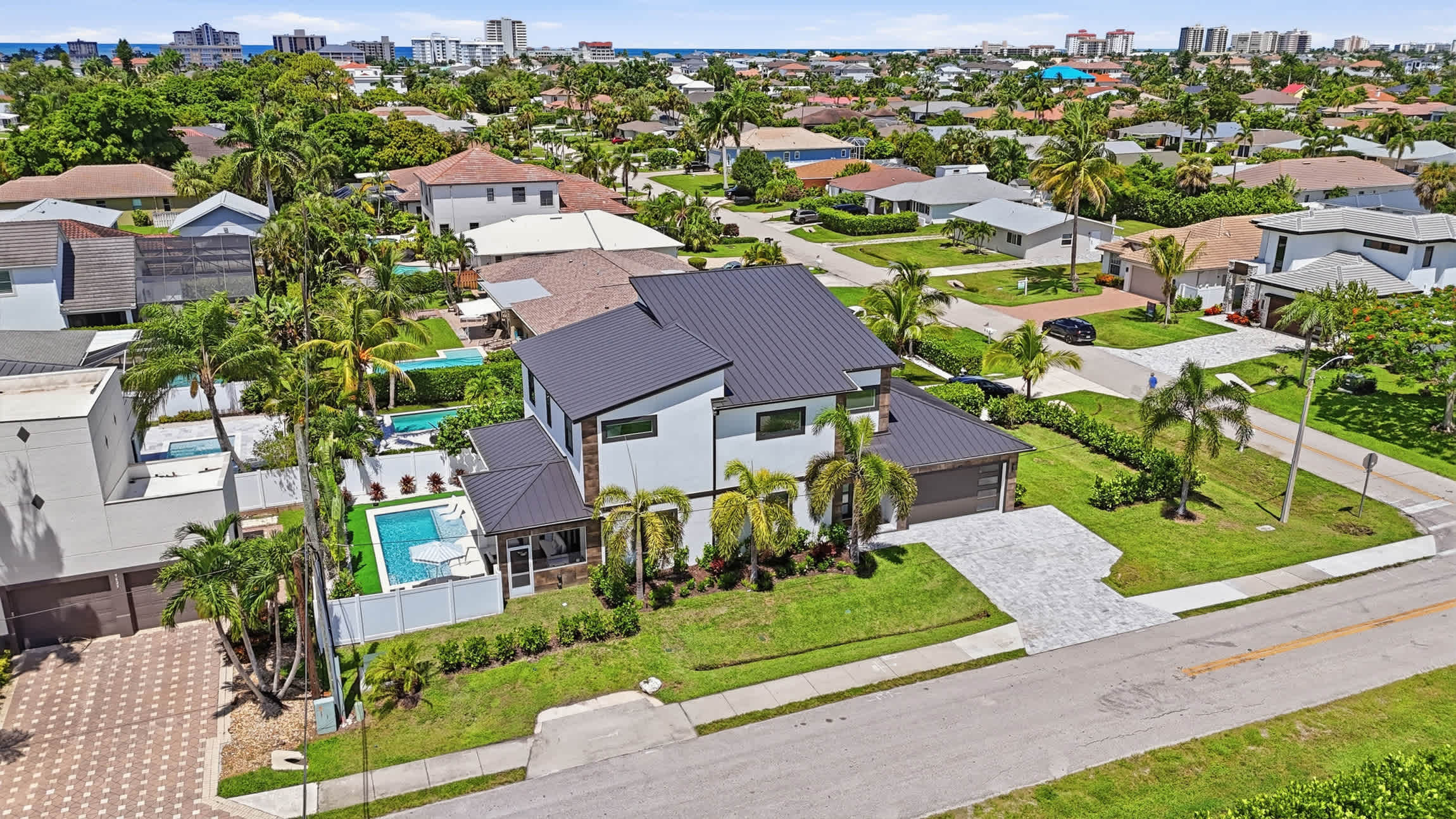 Brand New Luxury Pool Home Steps from the Gulf | Photo 51