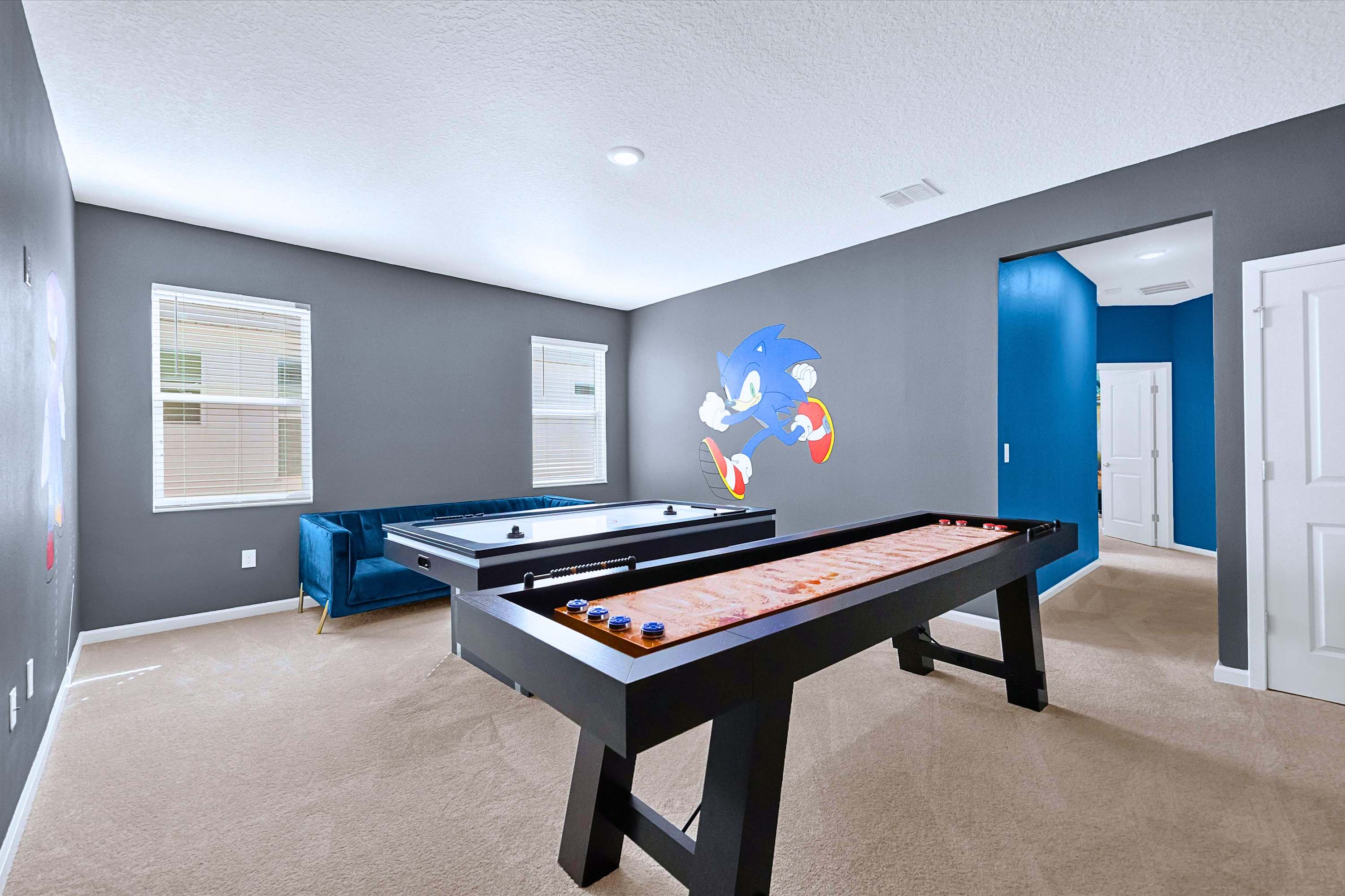 Game Room with Air Hockey & Foosball – Perfect for hours of family fun and friendly competition.