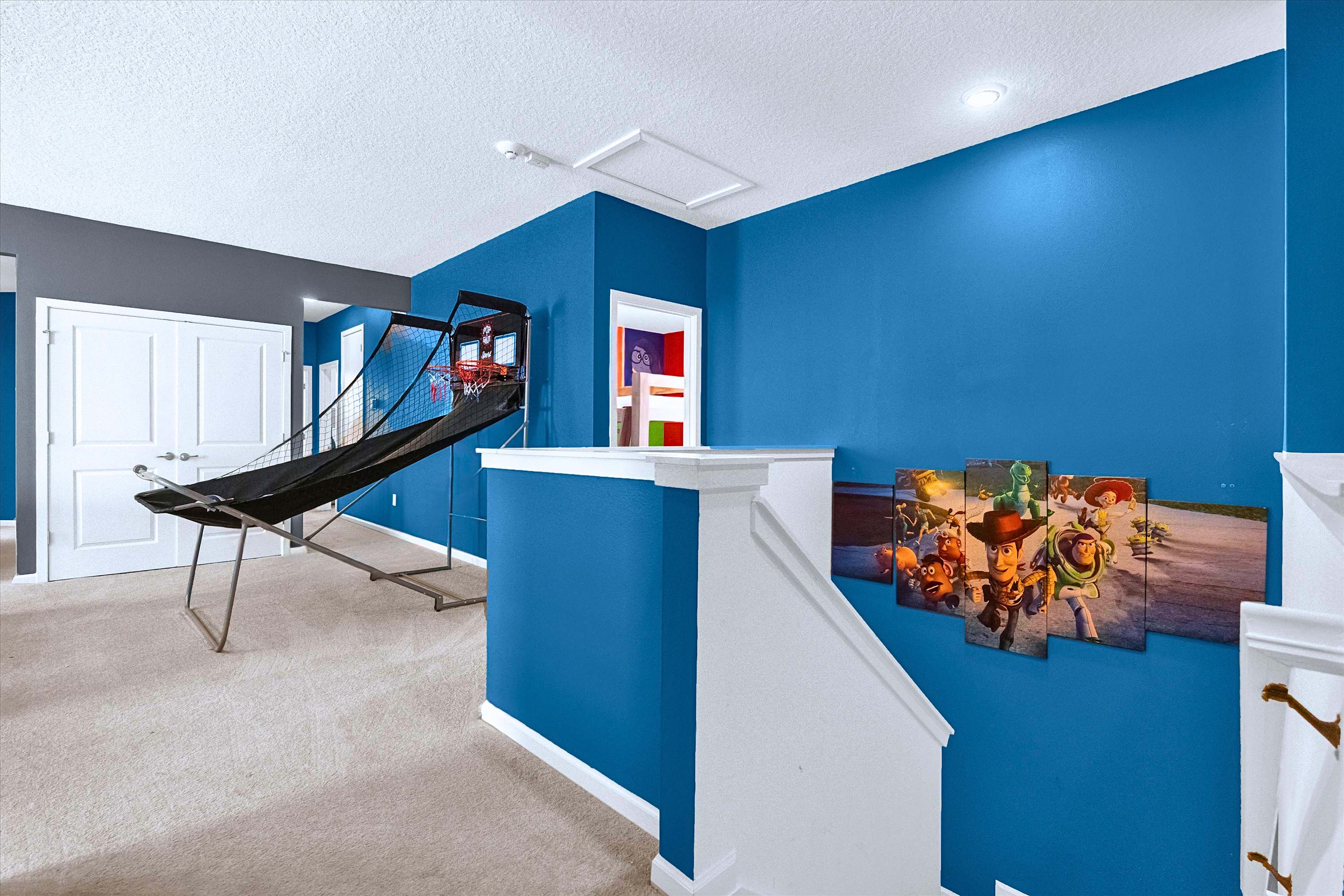 Entertainment Loft with Arcade Basketball – Challenge your friends in the upstairs game area.