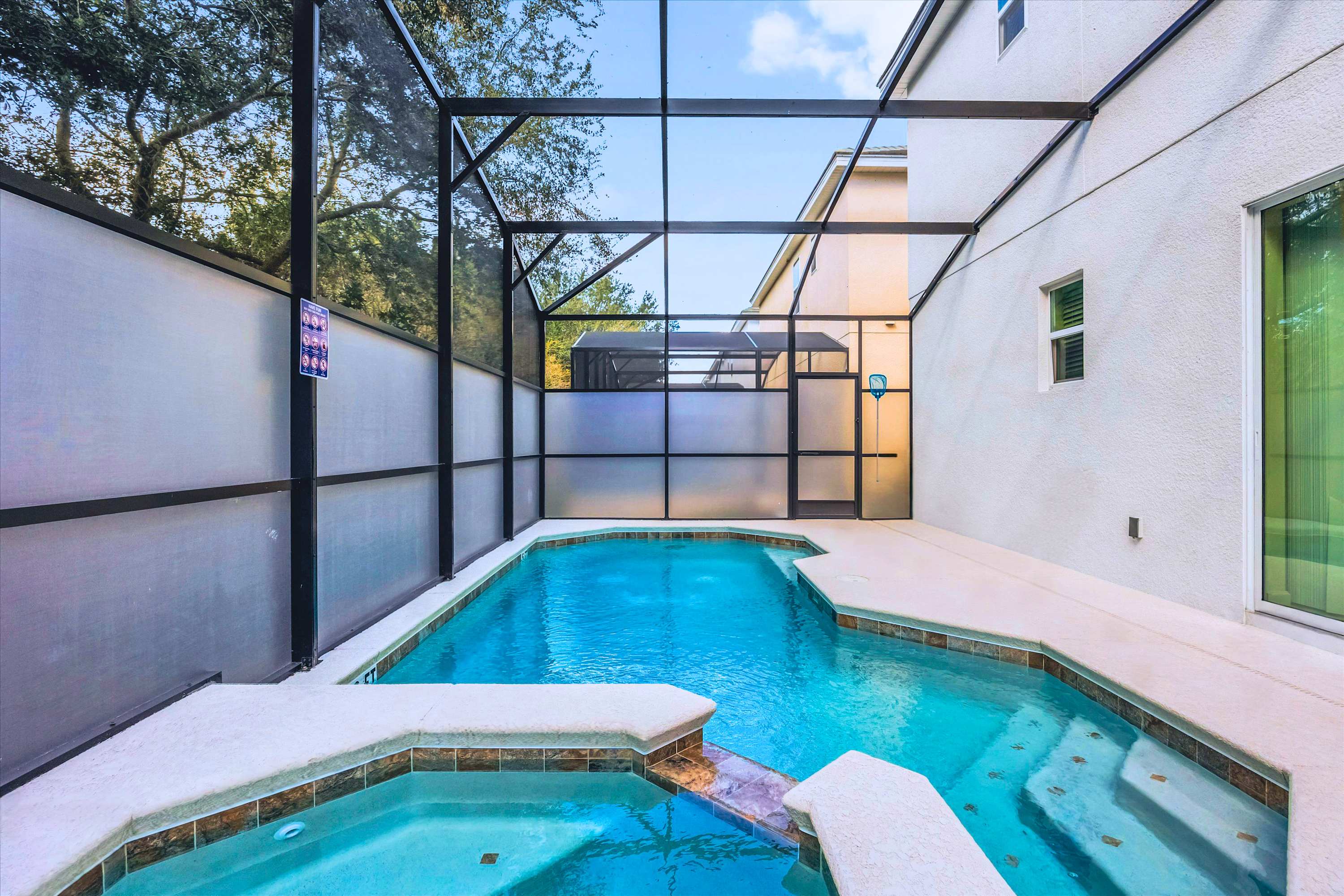 Private Screened Pool with Hot Tub – Relax in your own private pool and hot tub under a screened lanai.