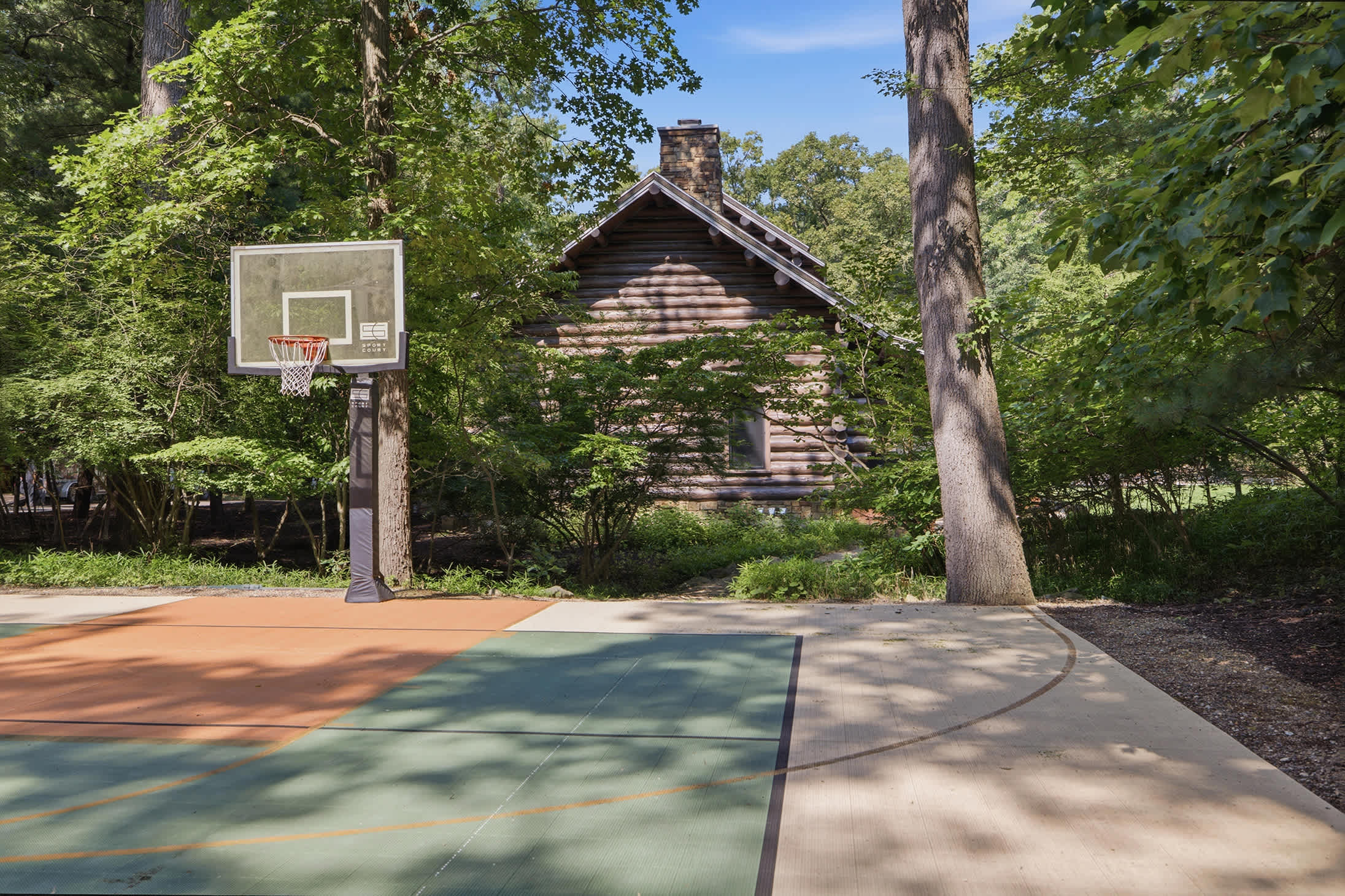 Outdoor basketball court gives guests another option for active group fun.