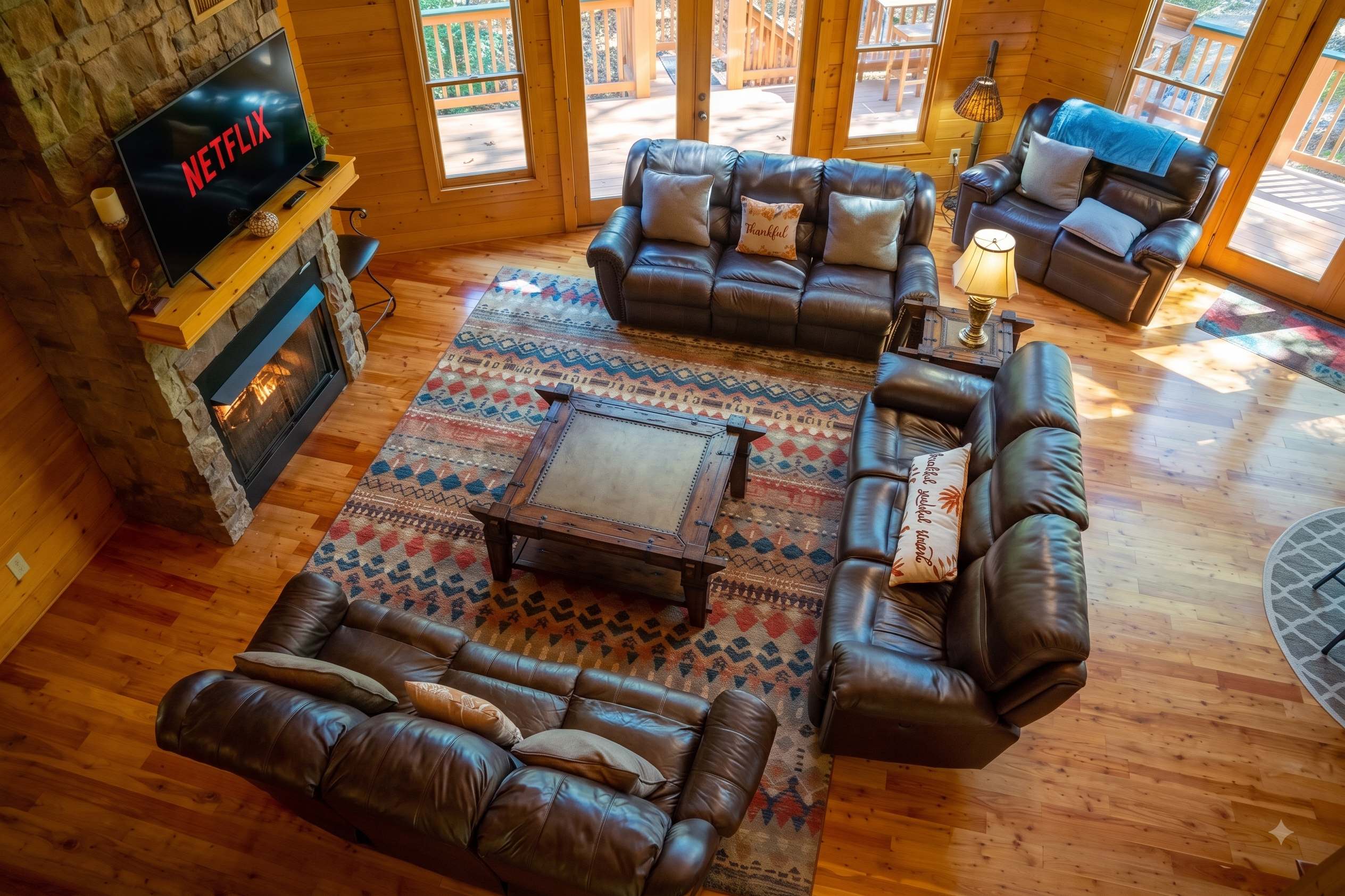 Sink into the cozy leather seating and unwind by the fireplace after a day of mountain adventures.