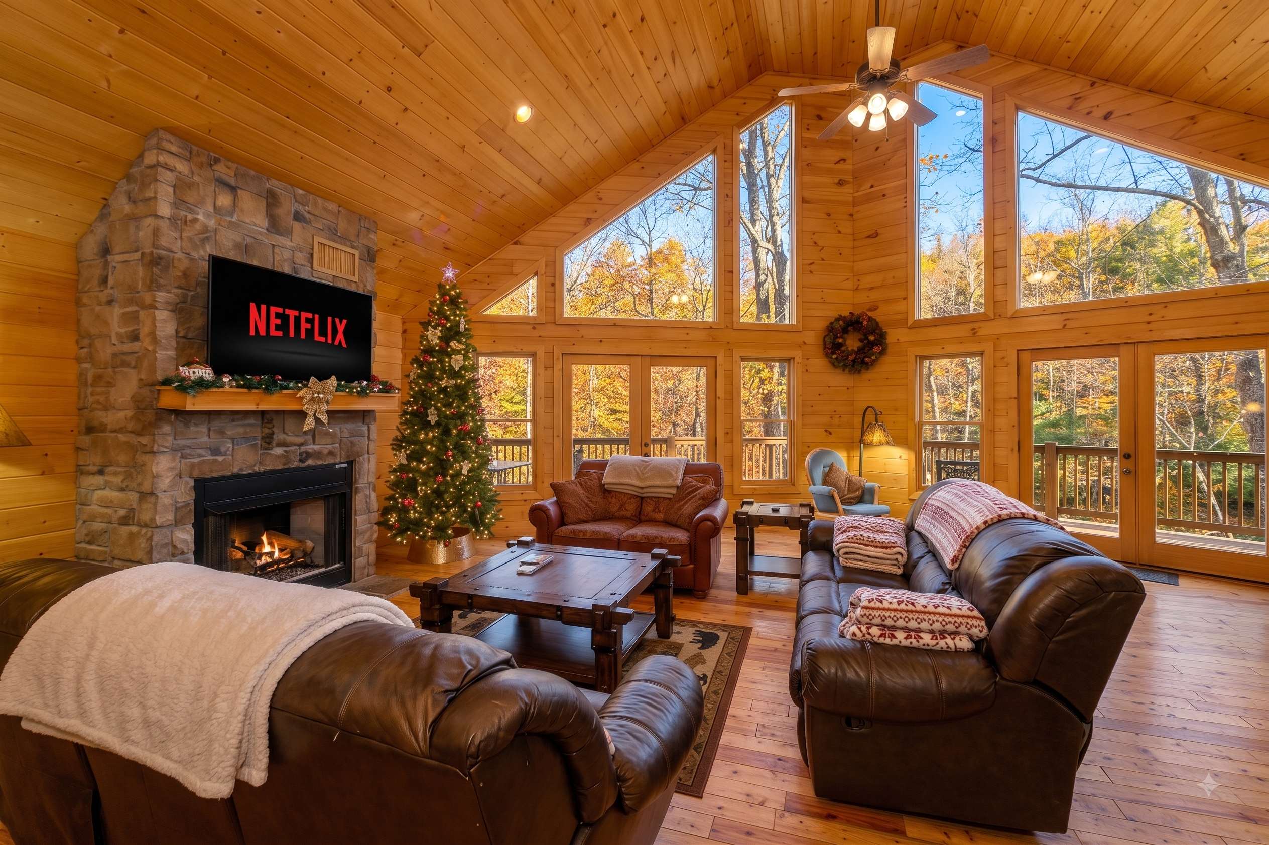 Gather around the stone fireplace and enjoy cozy evenings with loved ones in this spacious cabin retreat.