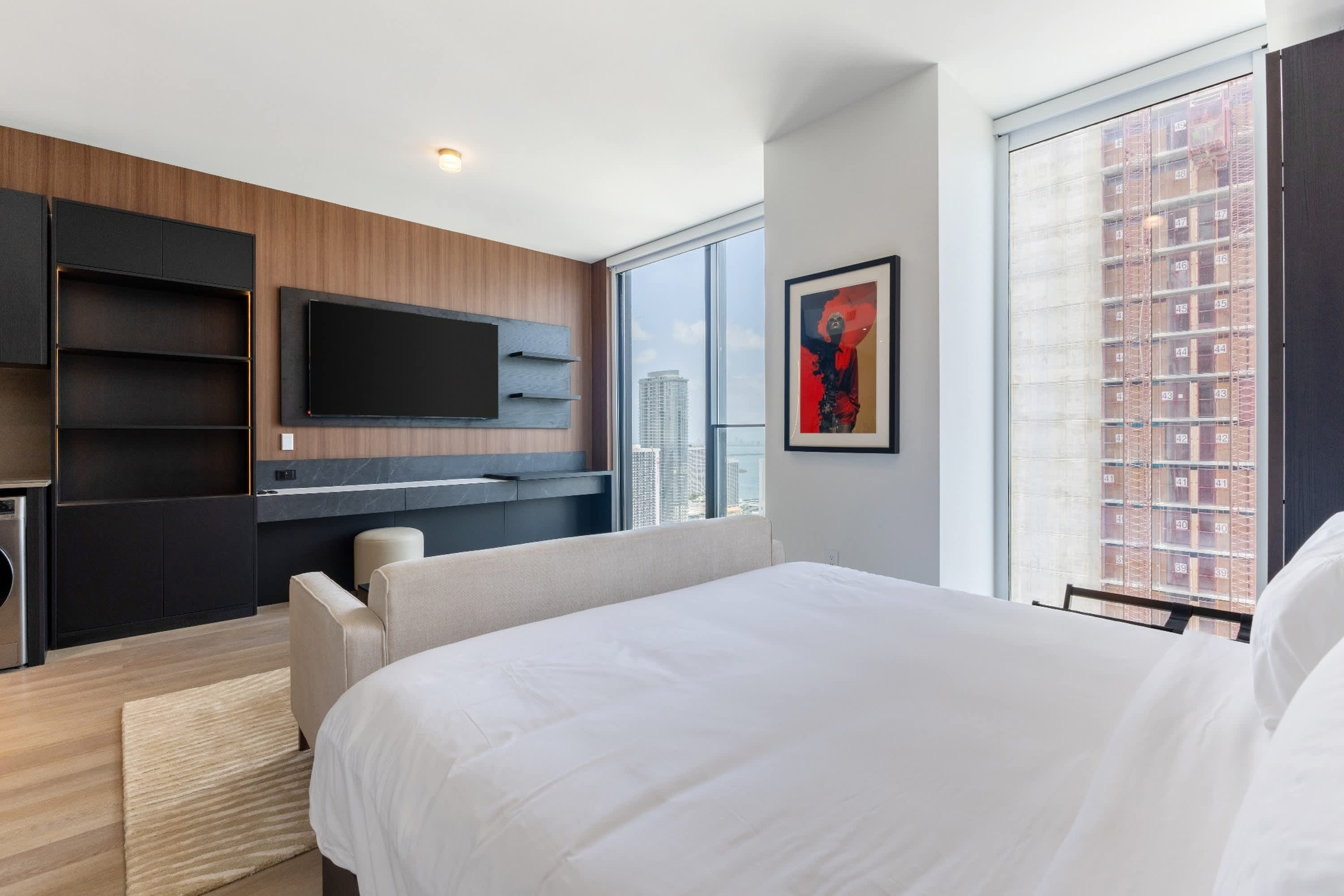 Unwind in the plush queen-sized bed & stream your favorites on the smart TV​