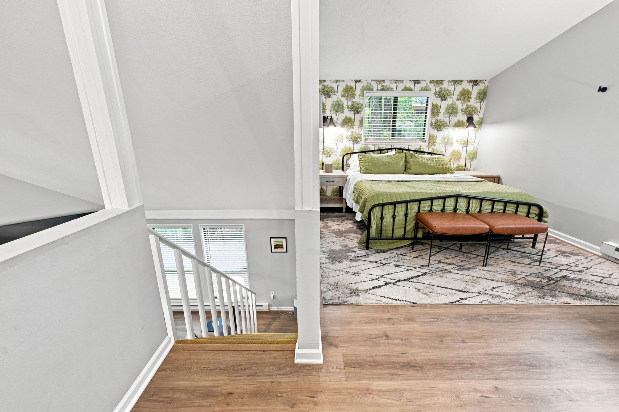 Loft Bedroom (open area): King bed w/ceiling fan and private attached bathroom with shower