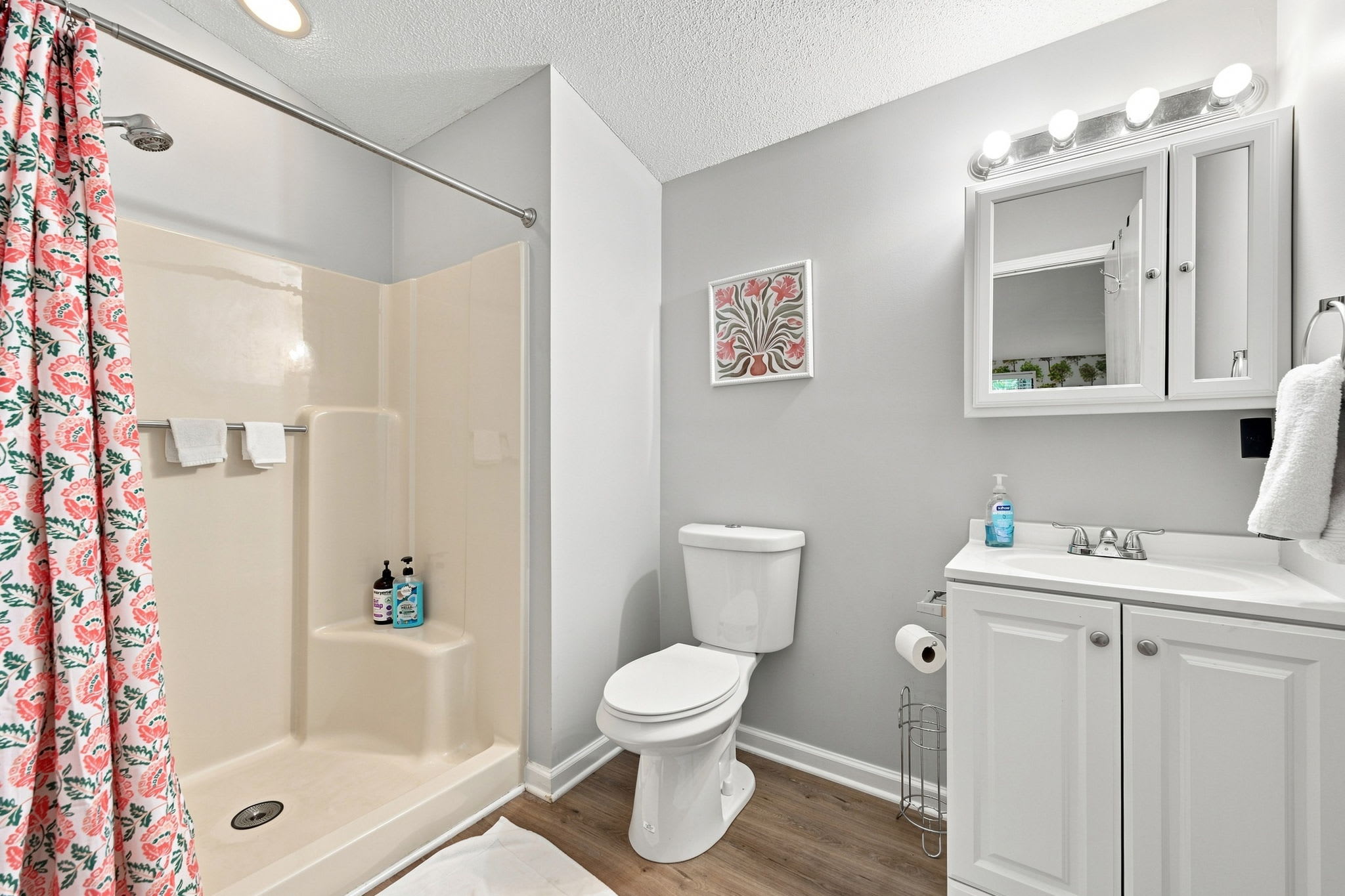 Bathroom 2 (Upper Level): Full bathroom with shower