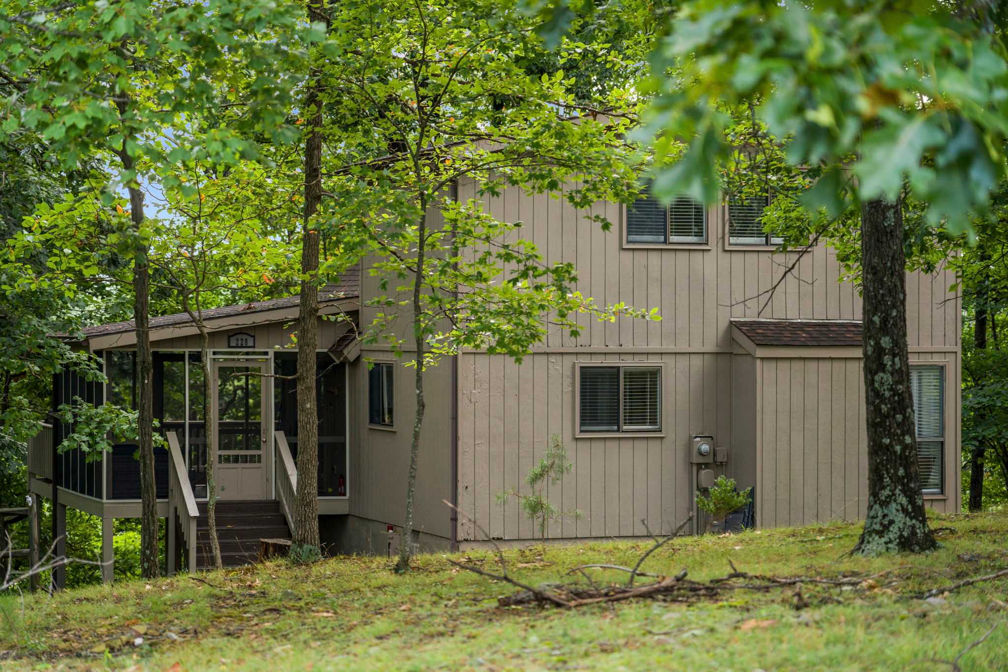 Slow down, breathe in the fresh mountain air, and enjoy a peaceful escape surrounded by trees in The Woods in Hedgesville, West Virginia.