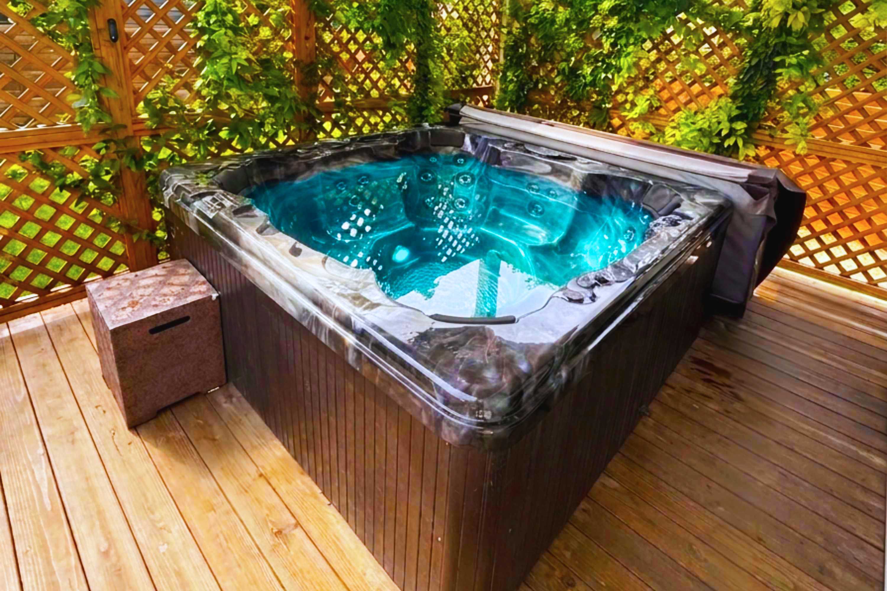 Soak, recharge, and melt stress away in your private hot tub