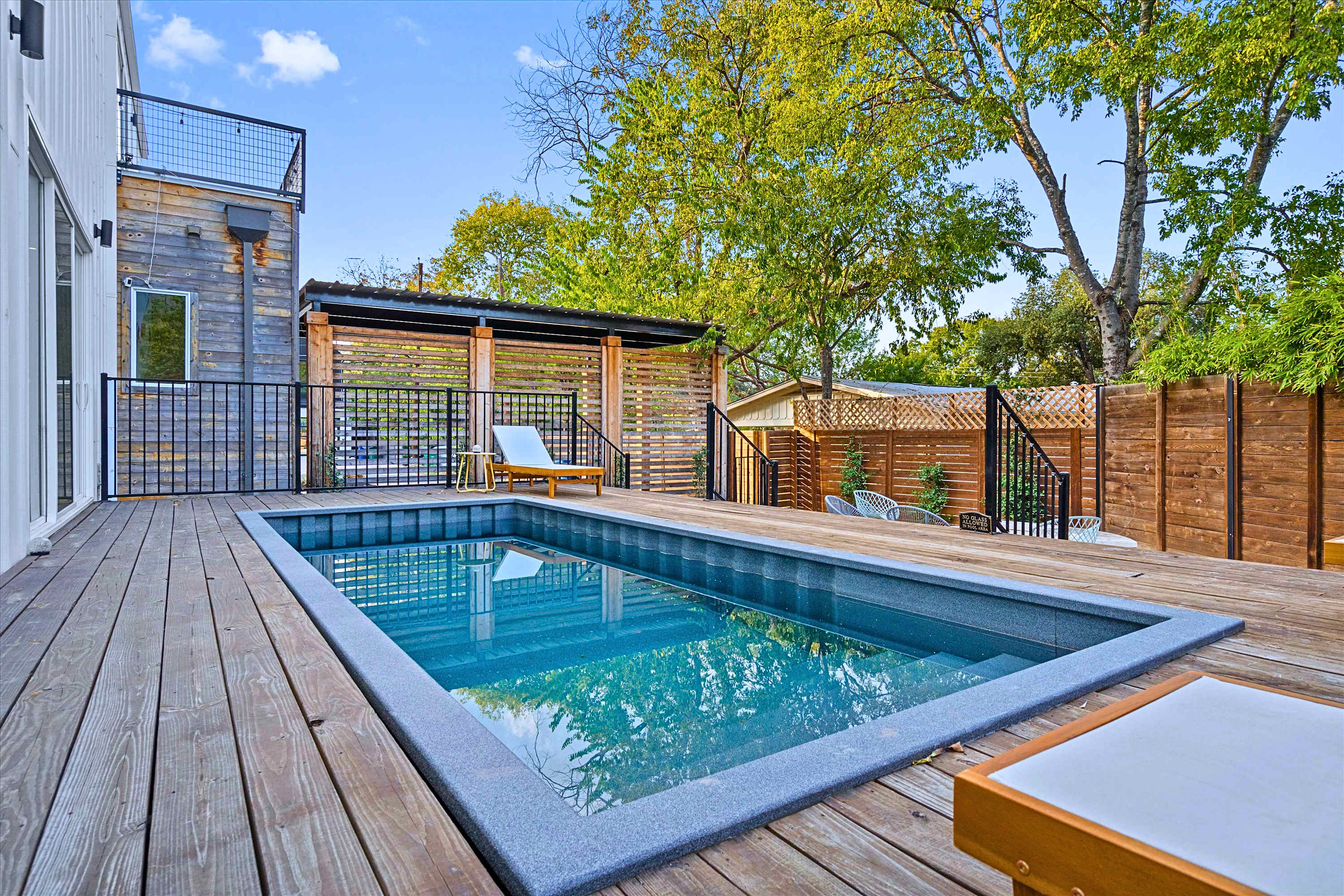 Soak Up the Sunshine and Relax by the Sparkling Pool