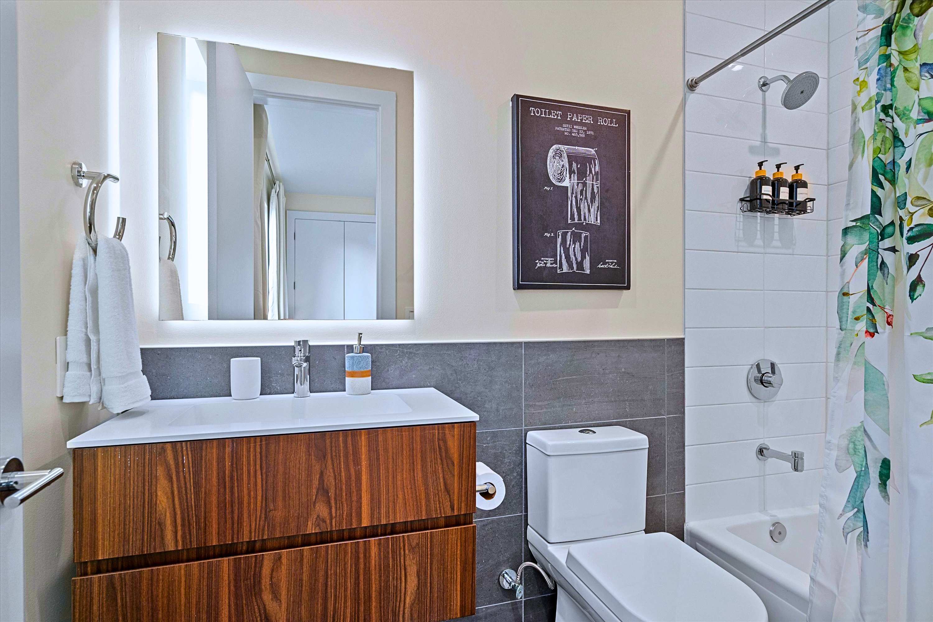 Bathtub, Shower Combo, Sink, Toilet & Glowing Mirror