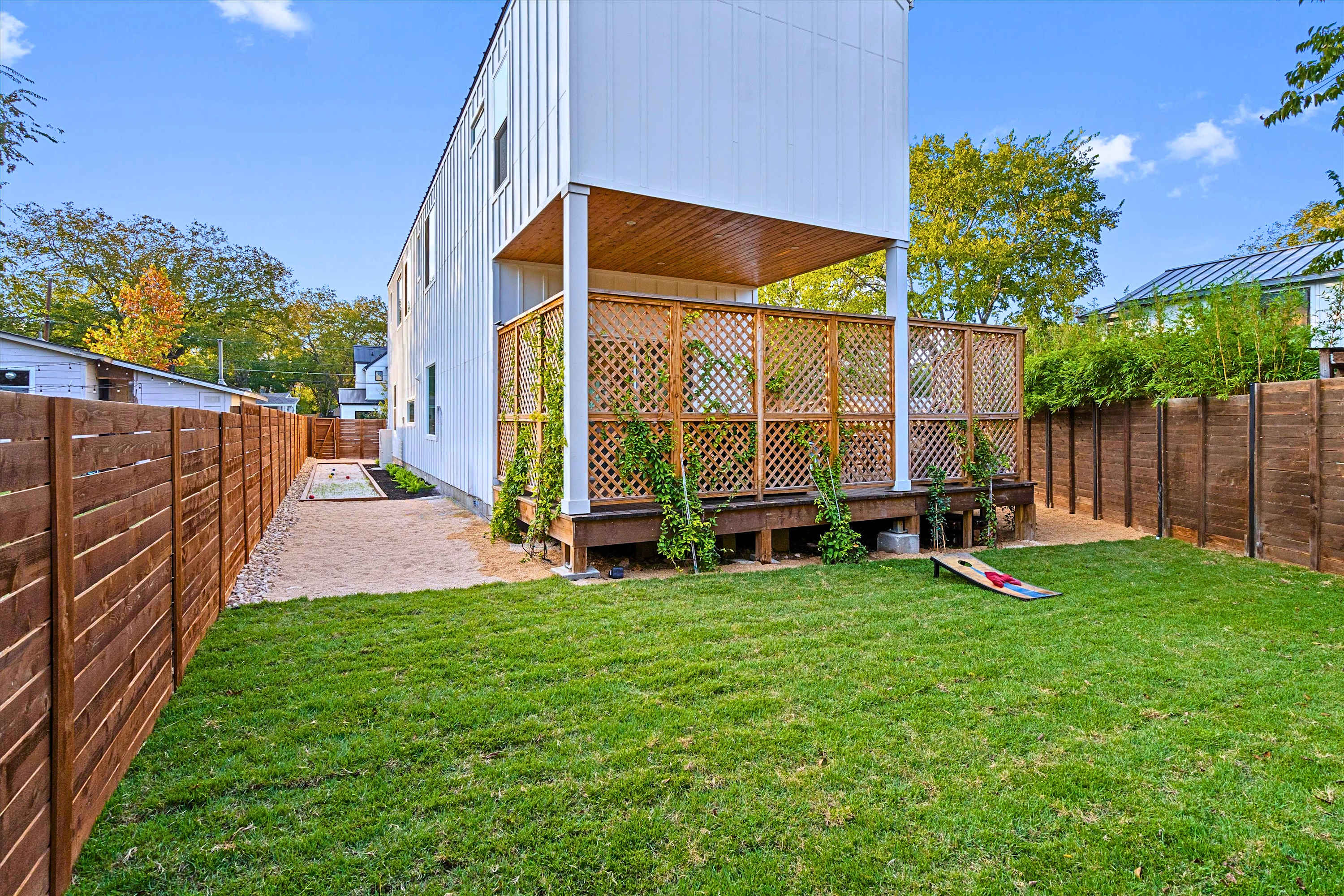 Grassy Outdoor Area Featuring Cornhole and Bocce Ball