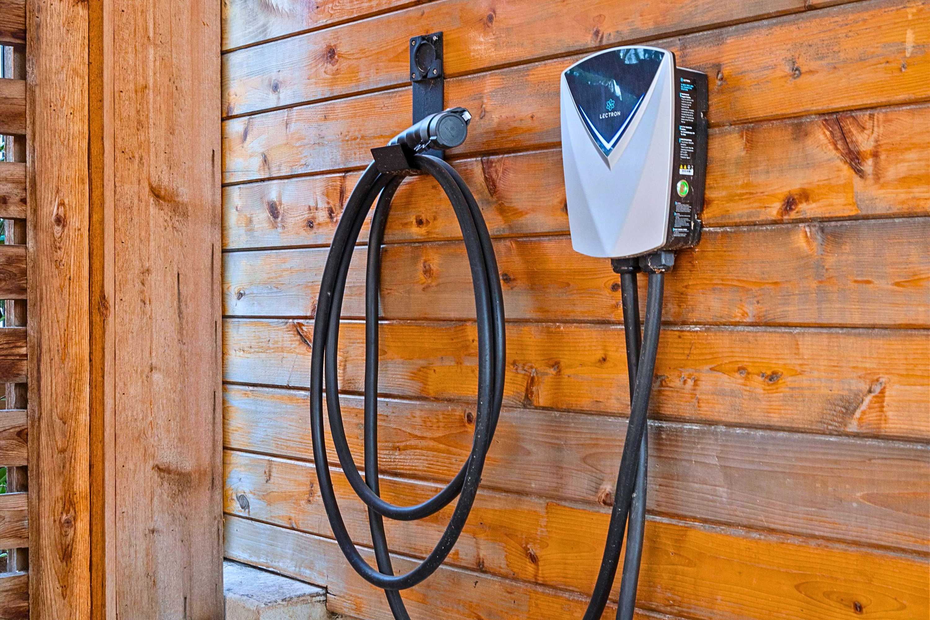 Charge with ease: convenient EV charging port right in your parking area