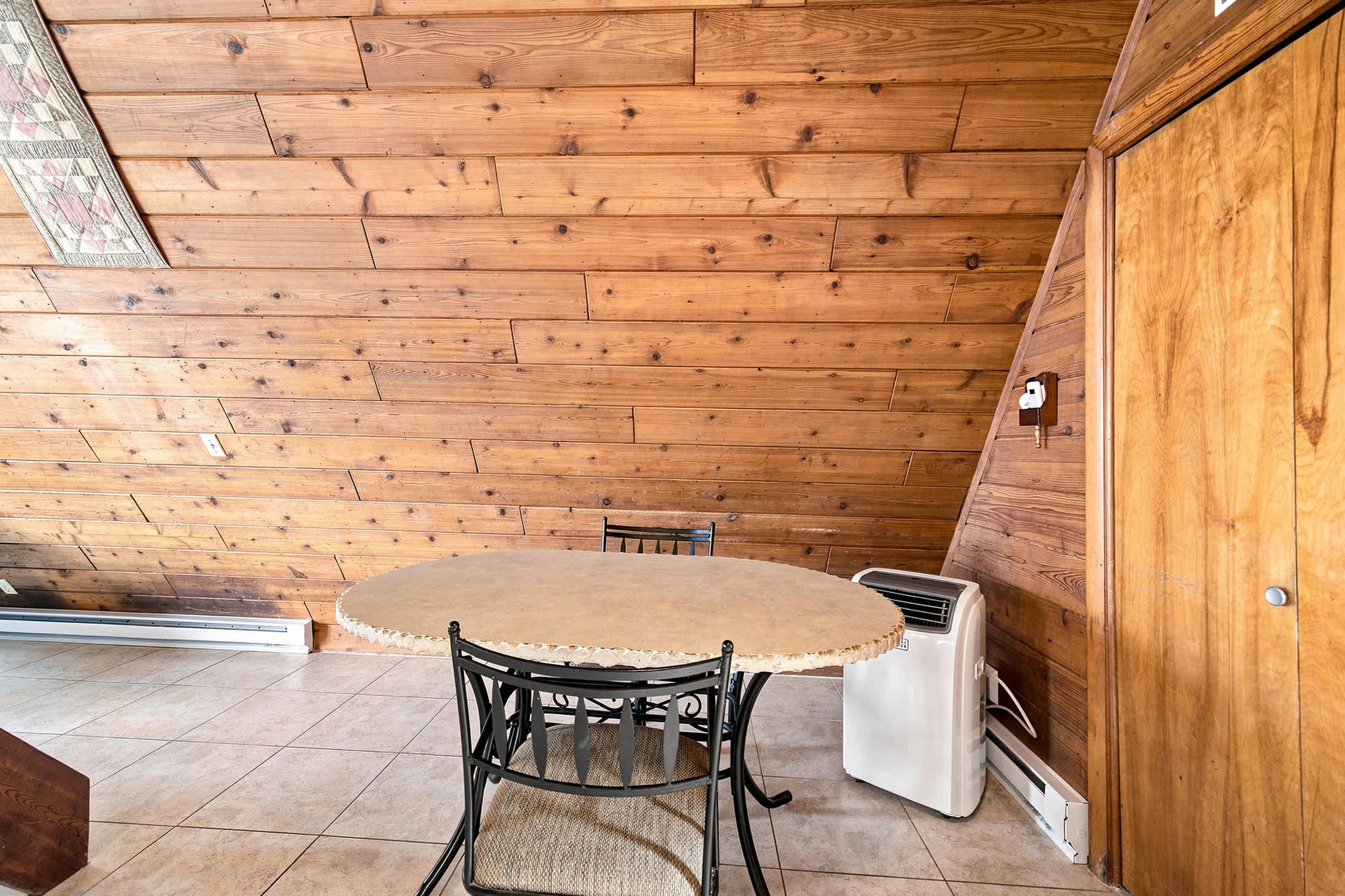Dining area is conveniently located beside the kitchen.