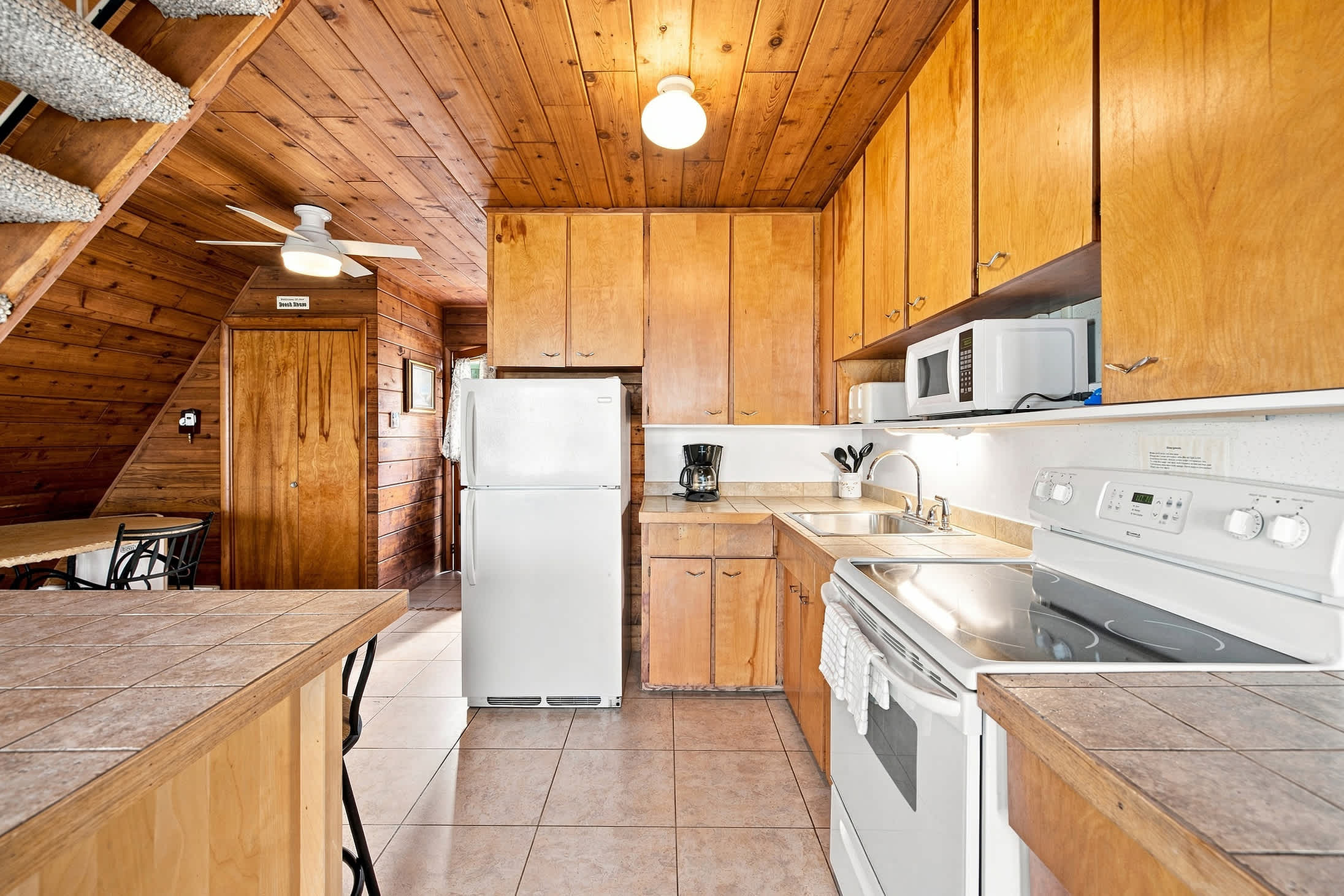 Full kitchen with ample counter space for convenient meal prep.