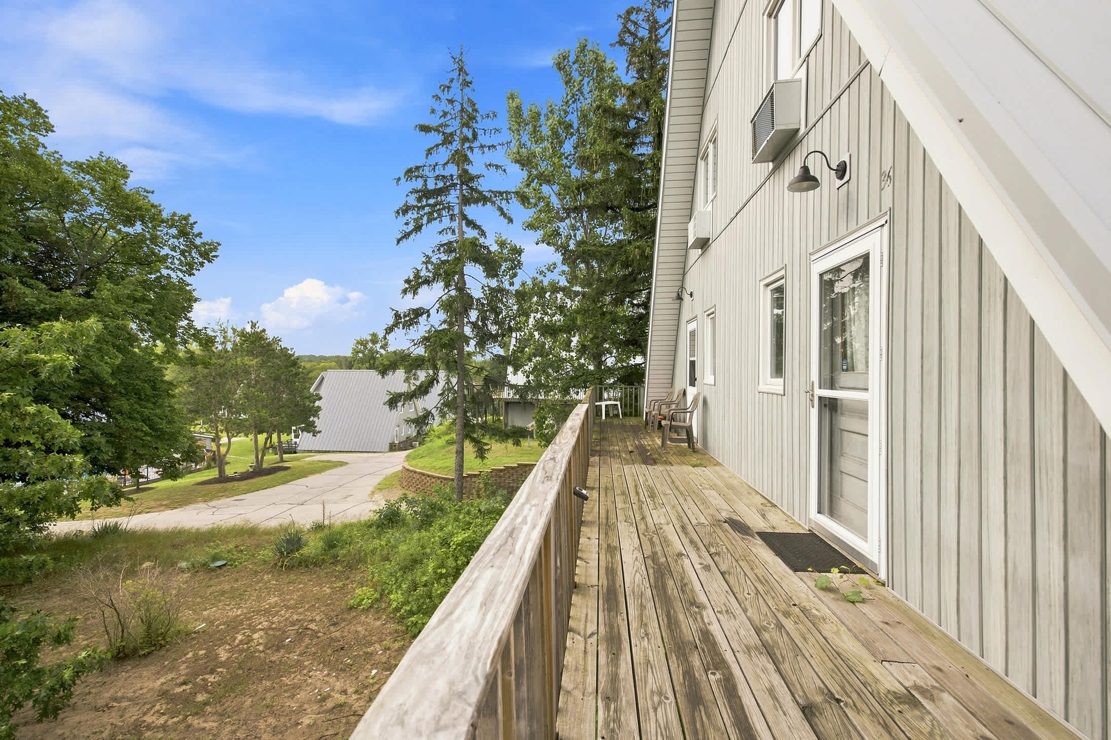 Wraparound deck adds convenient outdoor space along the side of Chalet #36.