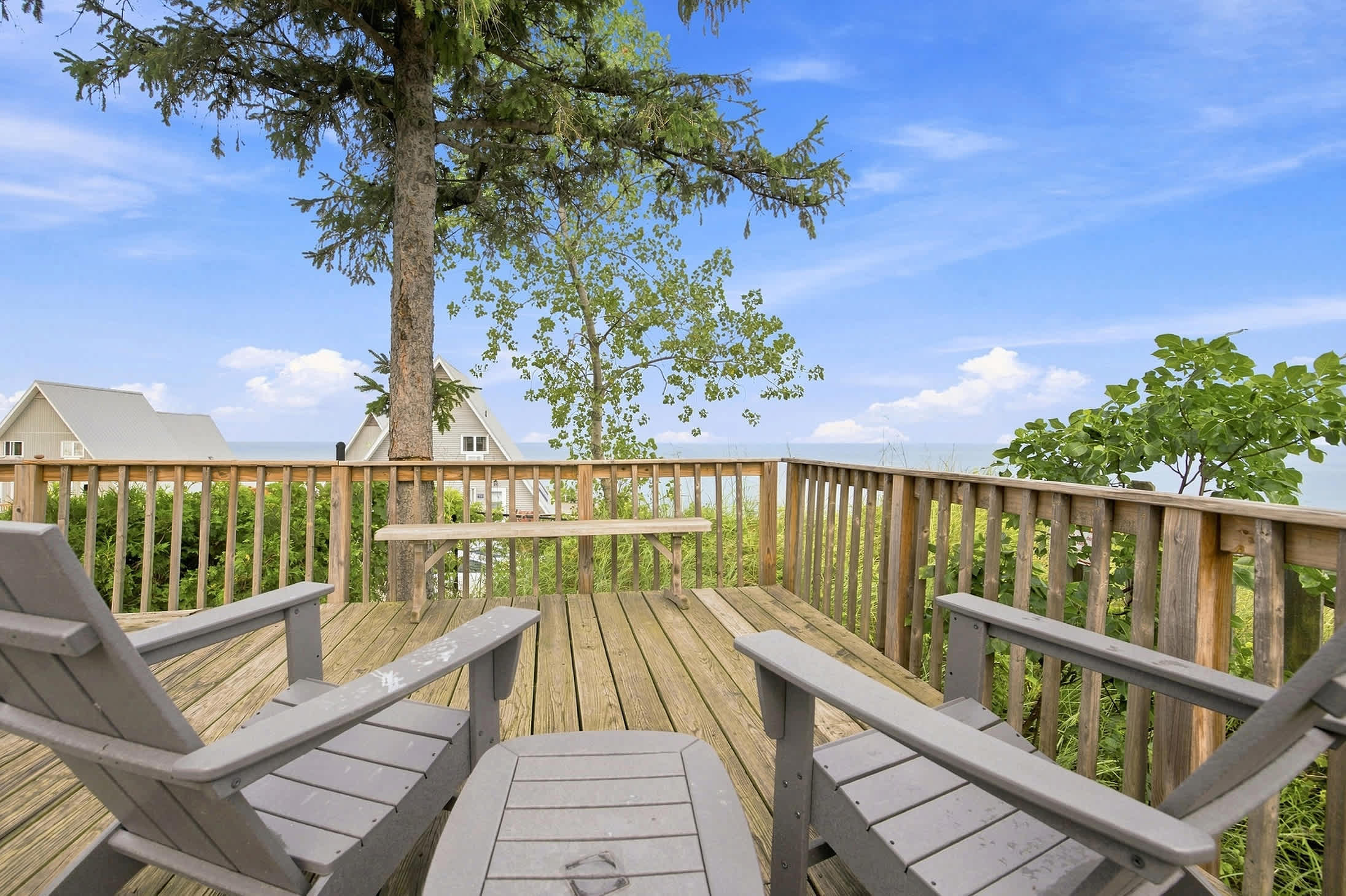 Adirondack seating on the deck offers front-row views of Lake Michigan.
