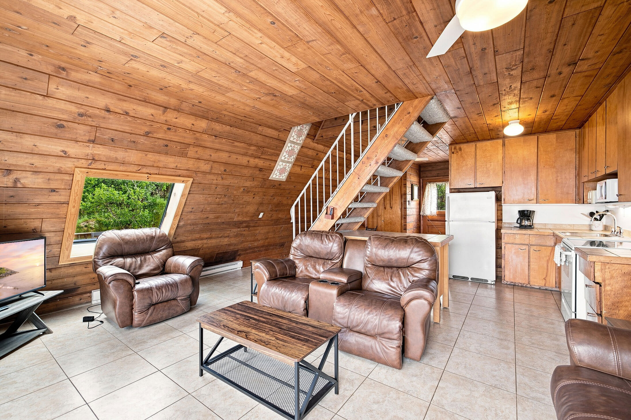 Open living area connects the kitchen and lounge for easy time together.