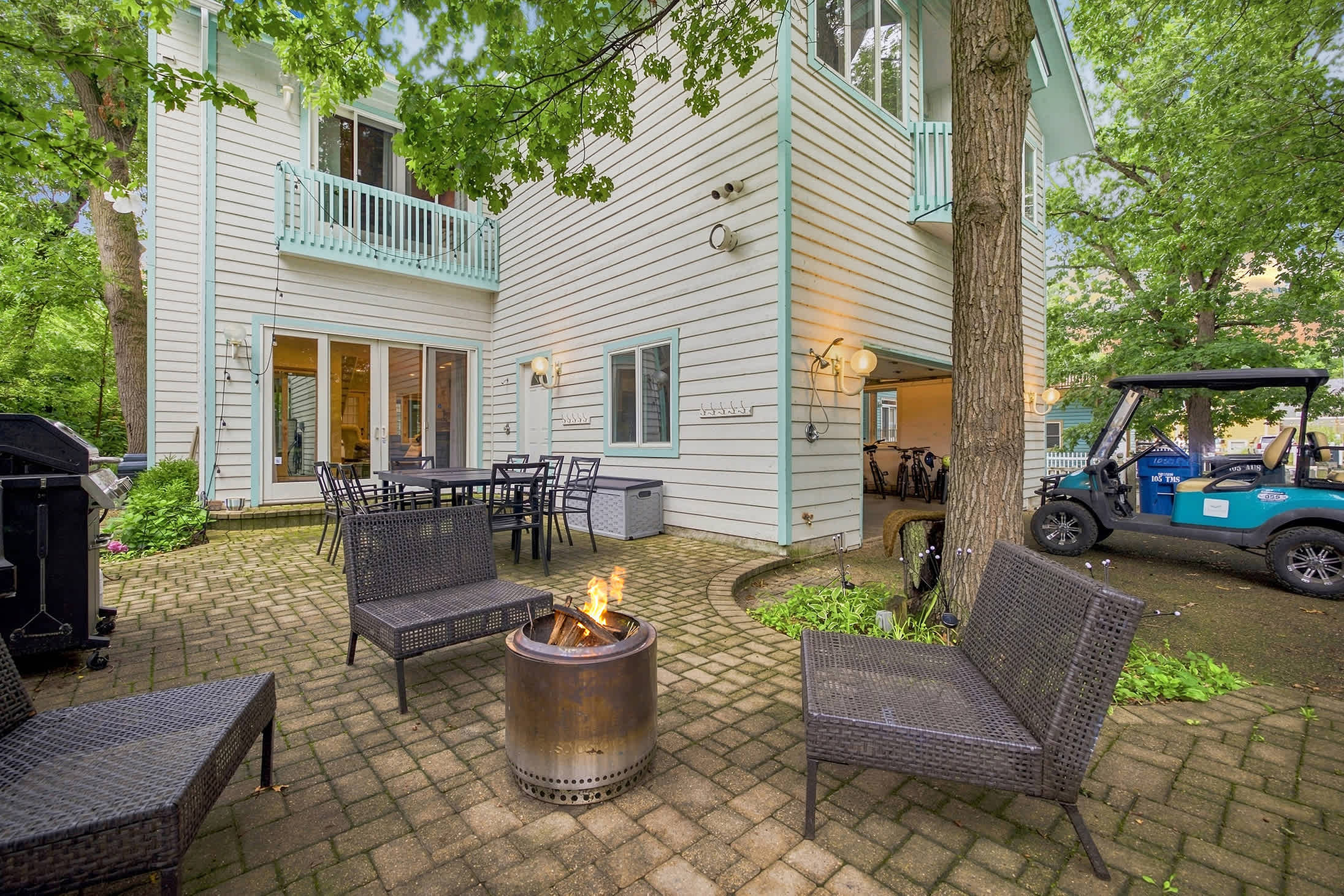 Private patio with fire pit, outdoor dining and grill for easy evenings outside.