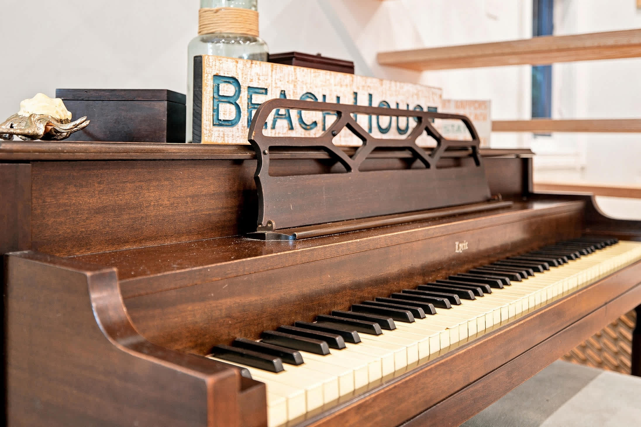Play music on our piano as evenings slow down and the house settles in.