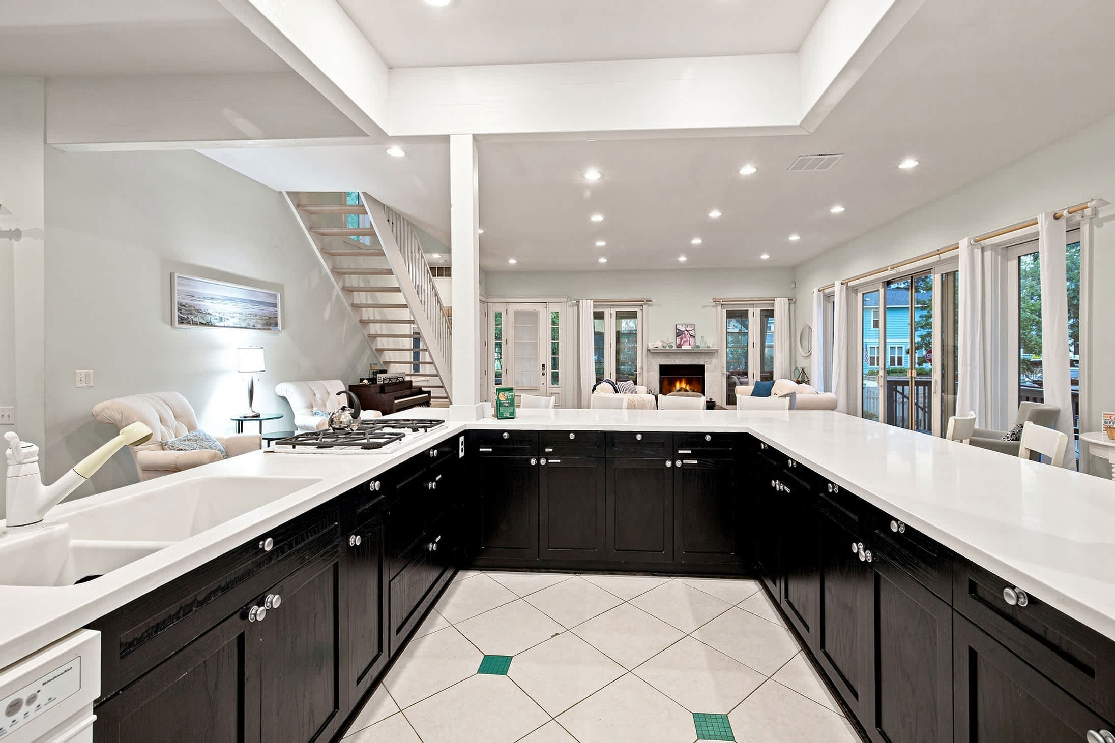 A generous kitchen where cooking stays social and everything flows.