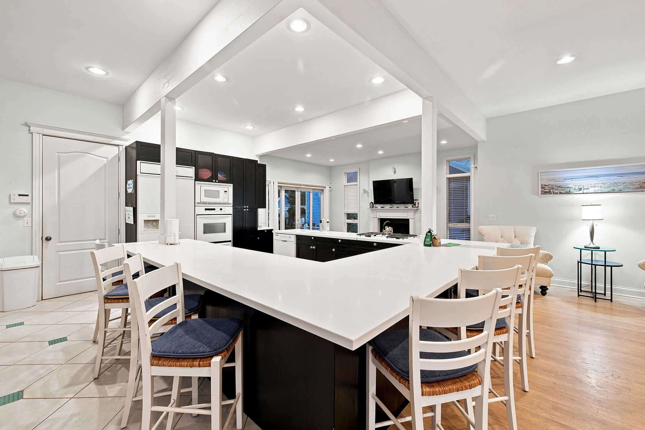 Cook together while everyone stays connected across the open living space.