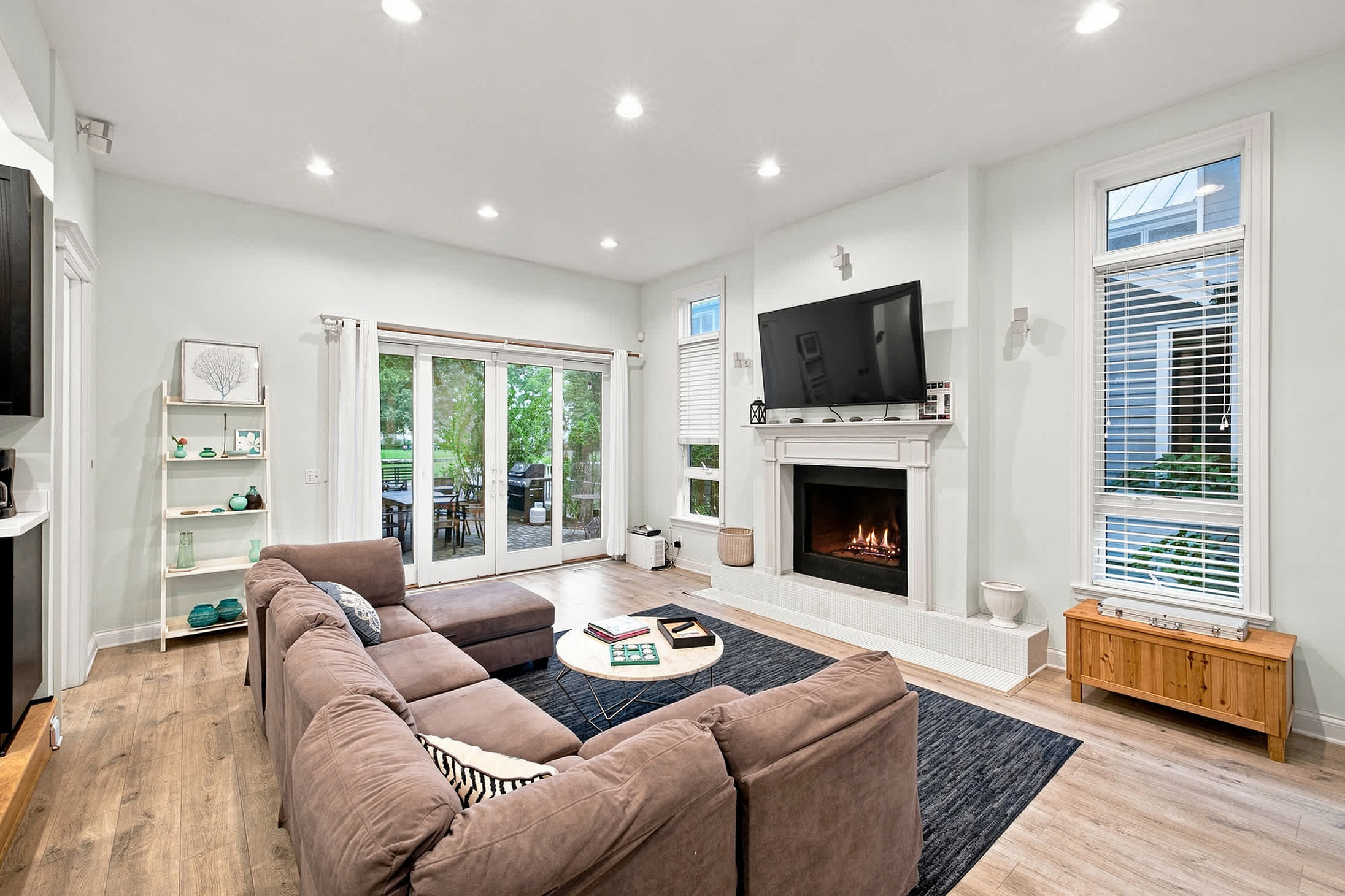 A second welcoming living room where movie nights family chats unfold. (fireplace not available for guest use)