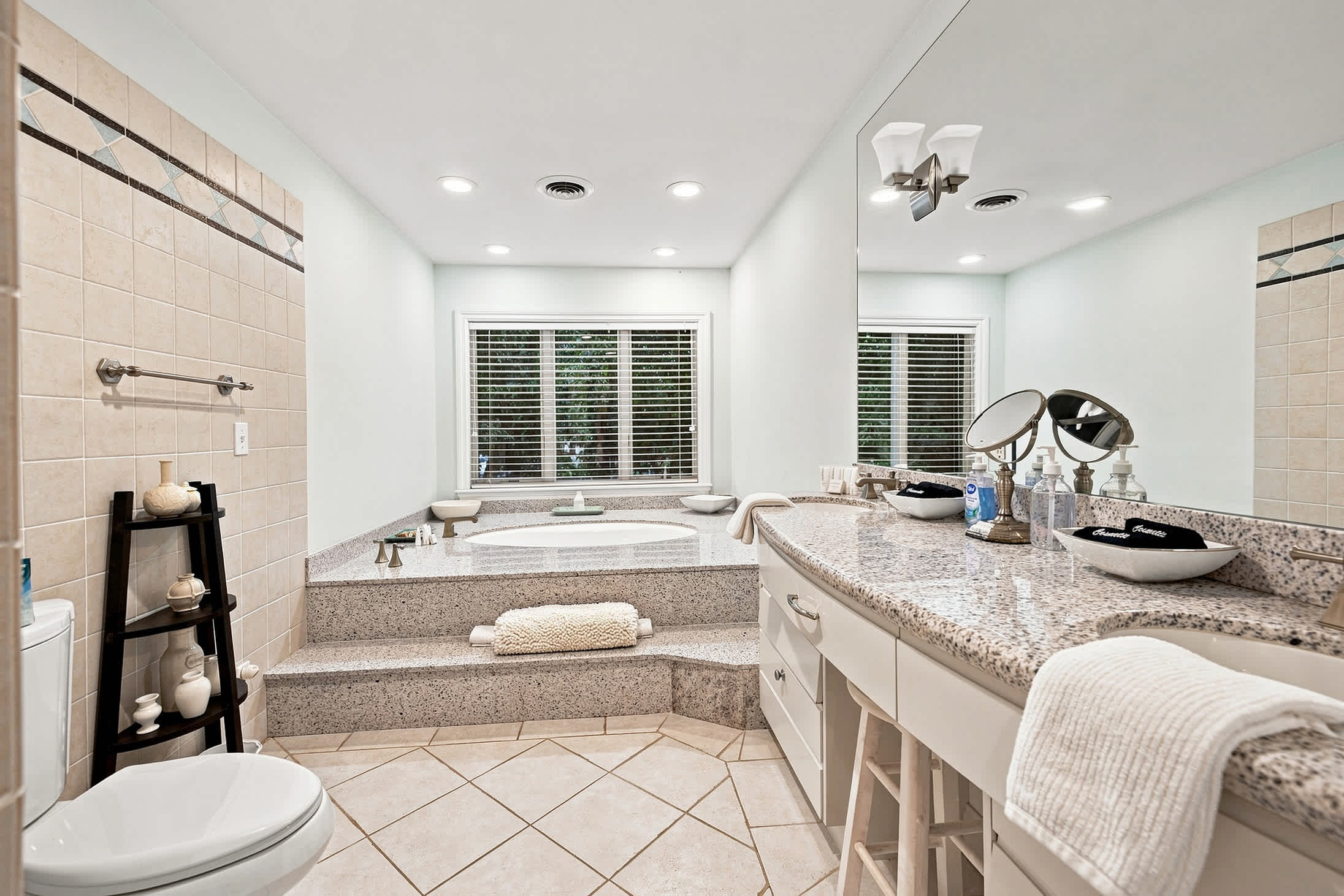 Take your time getting ready in a bright, spa-like bath.