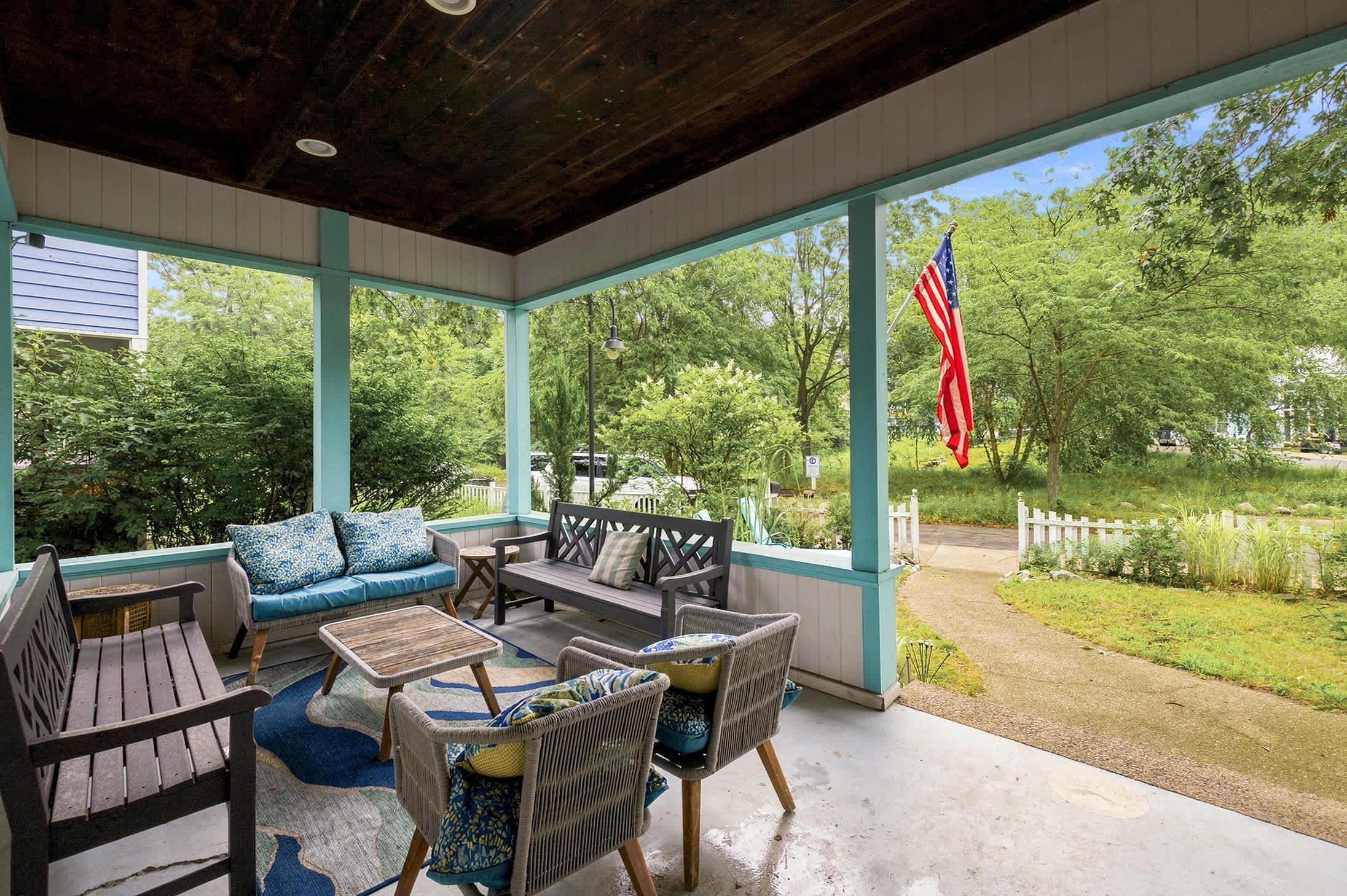Hang out on the front porch with plush seating and neighborhood views.