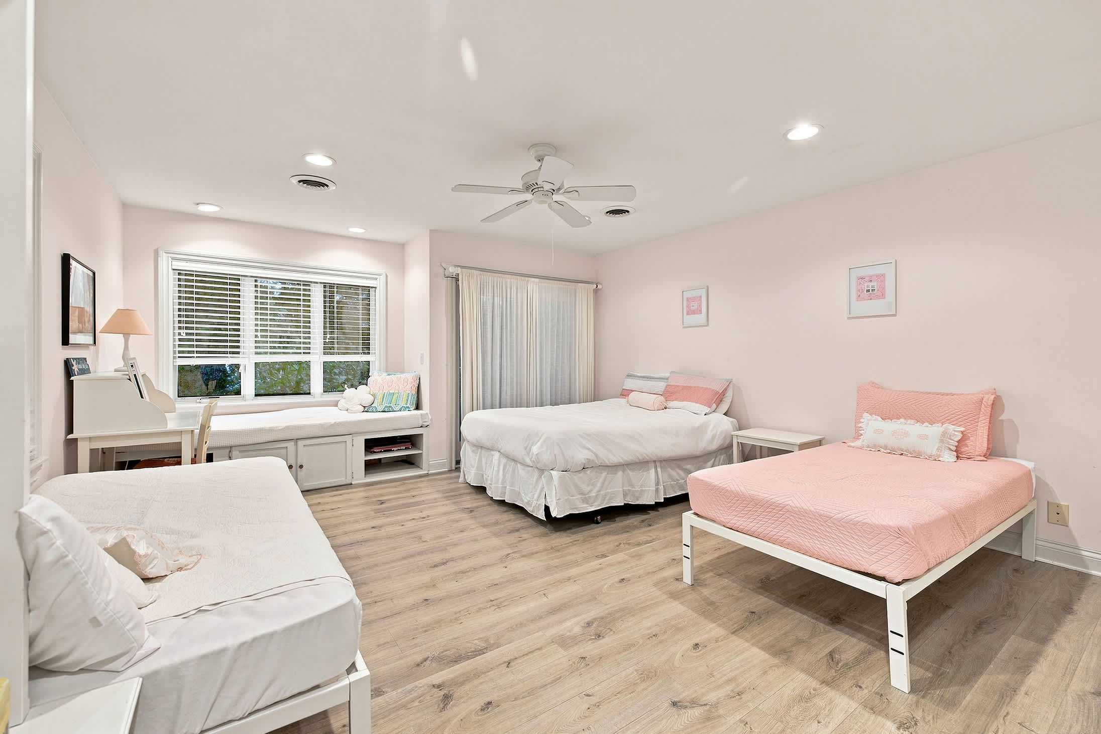 Bedroom 4 is on the upper level and has 1 queen and 2 single beds.