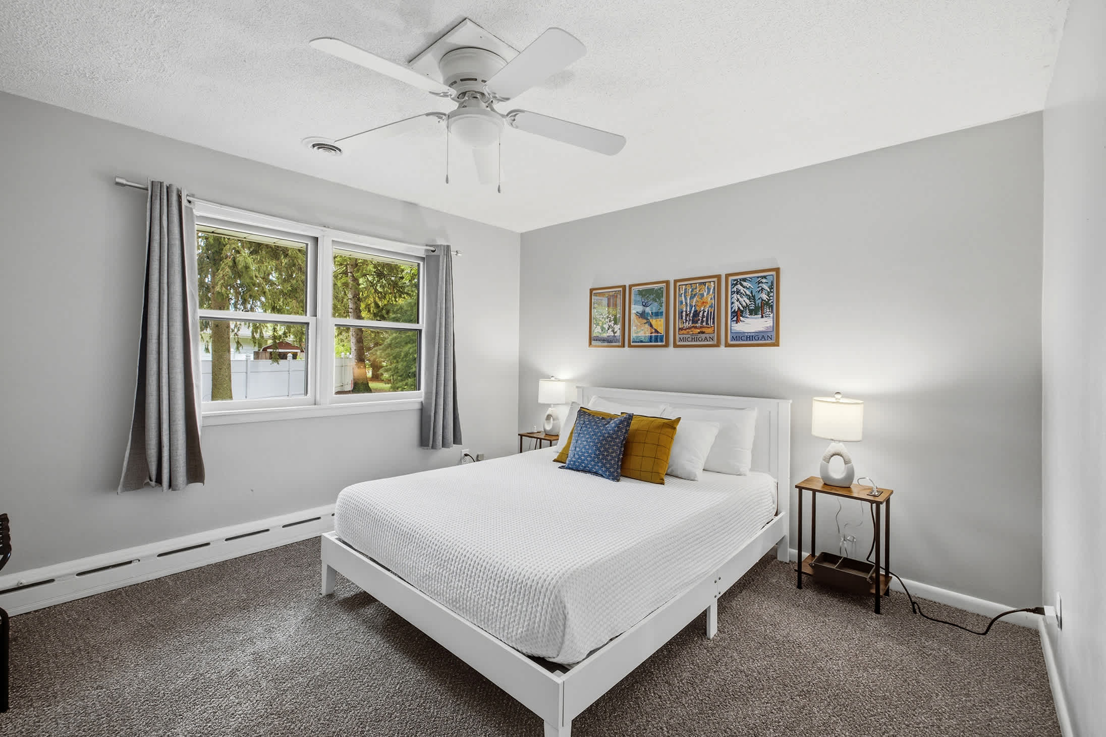 Bedroom 3 is located on the upper level with queen-sized bed.