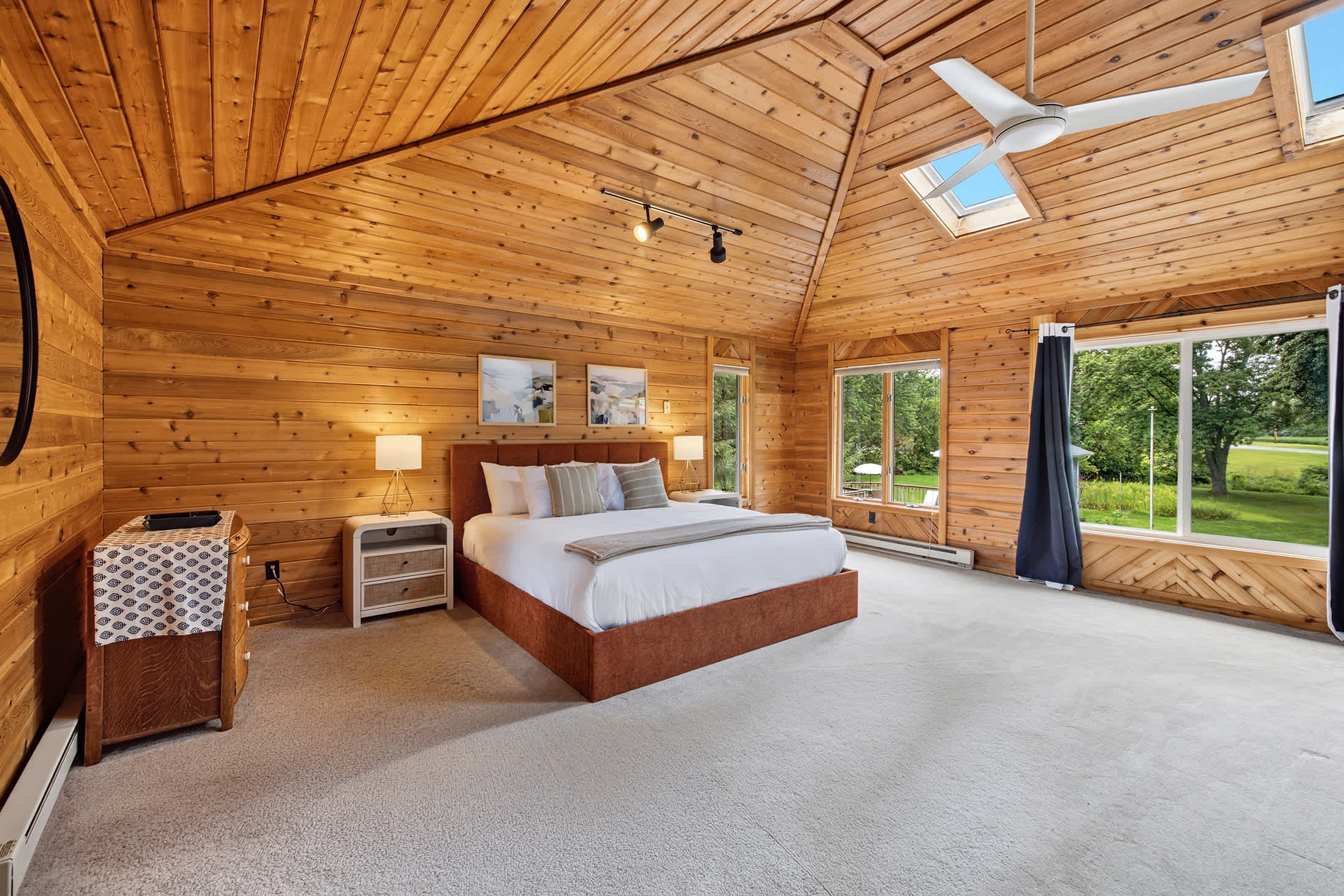 Primary Suite is on the upper level with a king-sized bed.