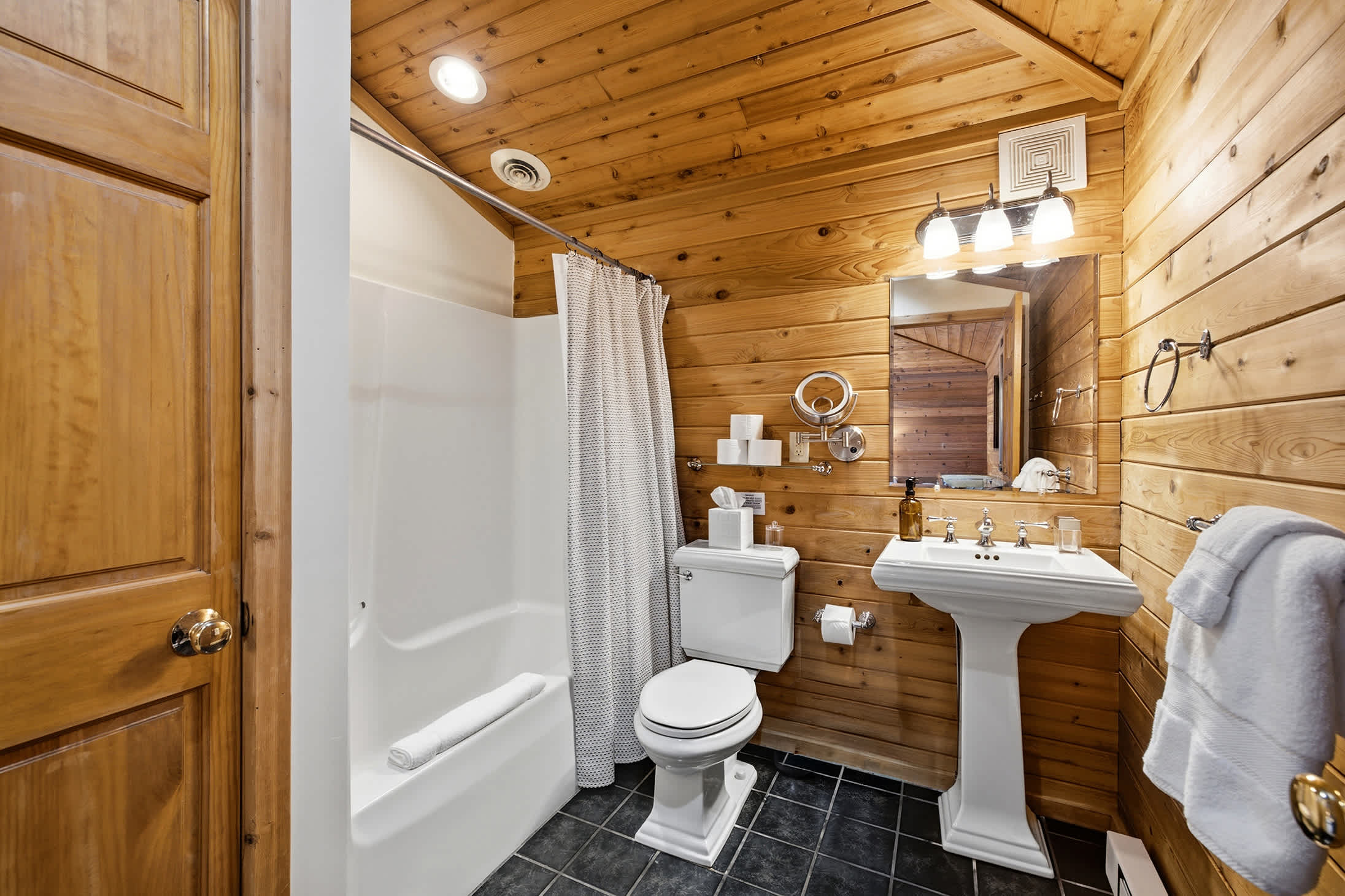 Full bath with a tub and shower gives guests flexible daily routines.