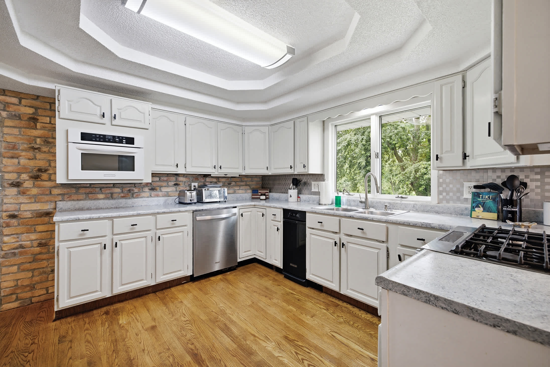 Main level kitchen with expansive counters for easy group cooking.