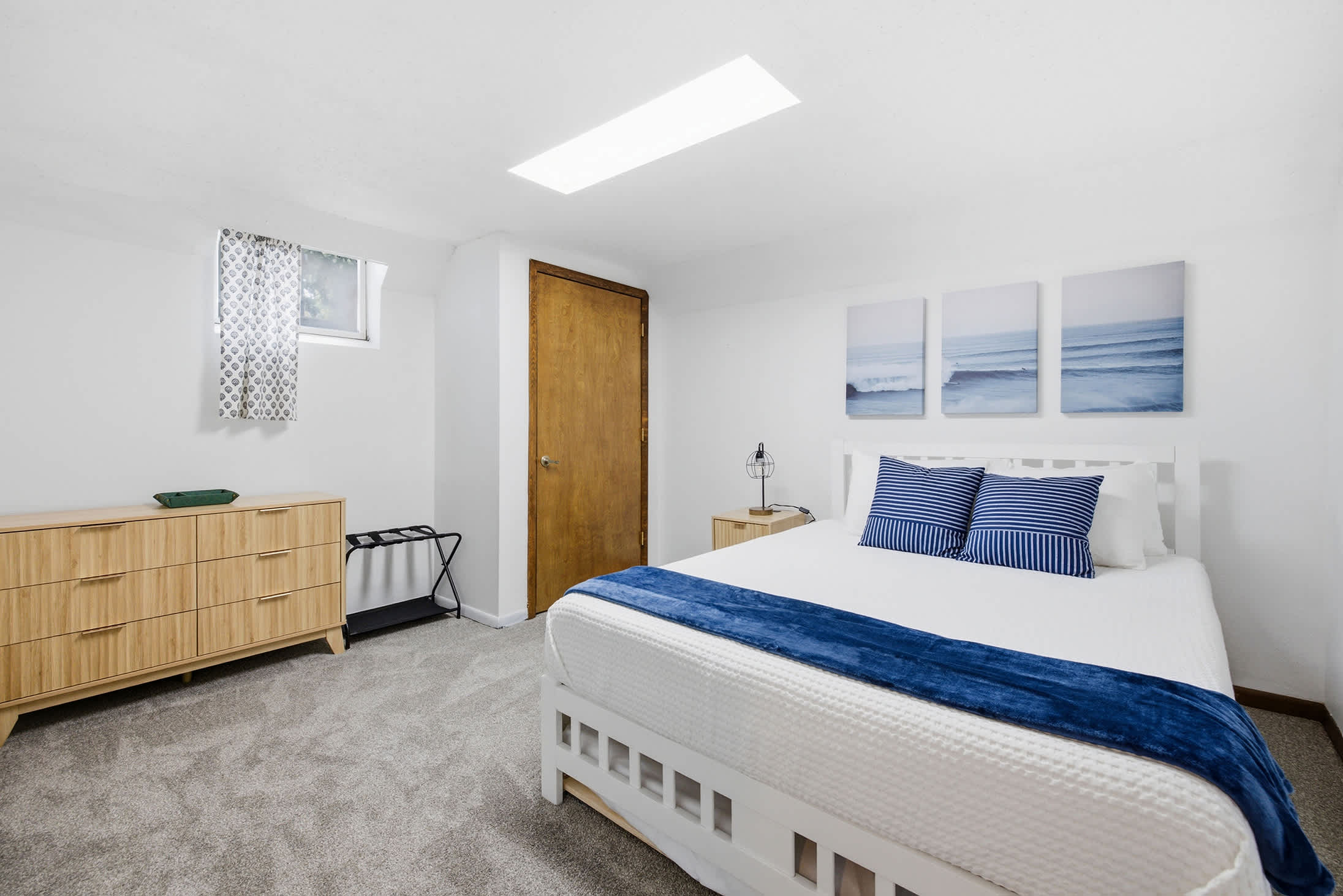 Bedroom 5 is located on the main level with a queen-size and single trundle bed.