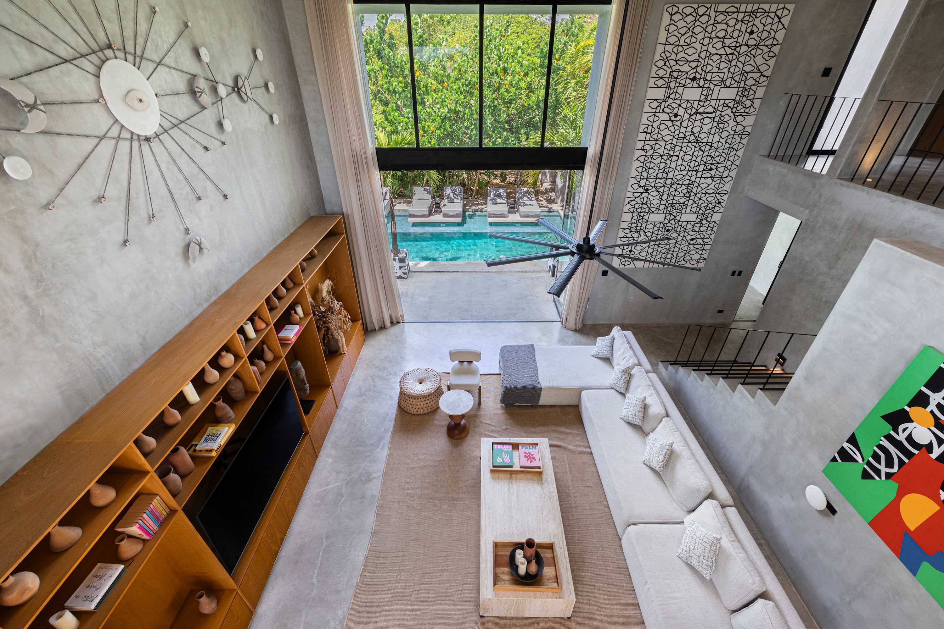 Expansive living room designed for both productivity and relaxation—ideal for working from home or socializing with friends.