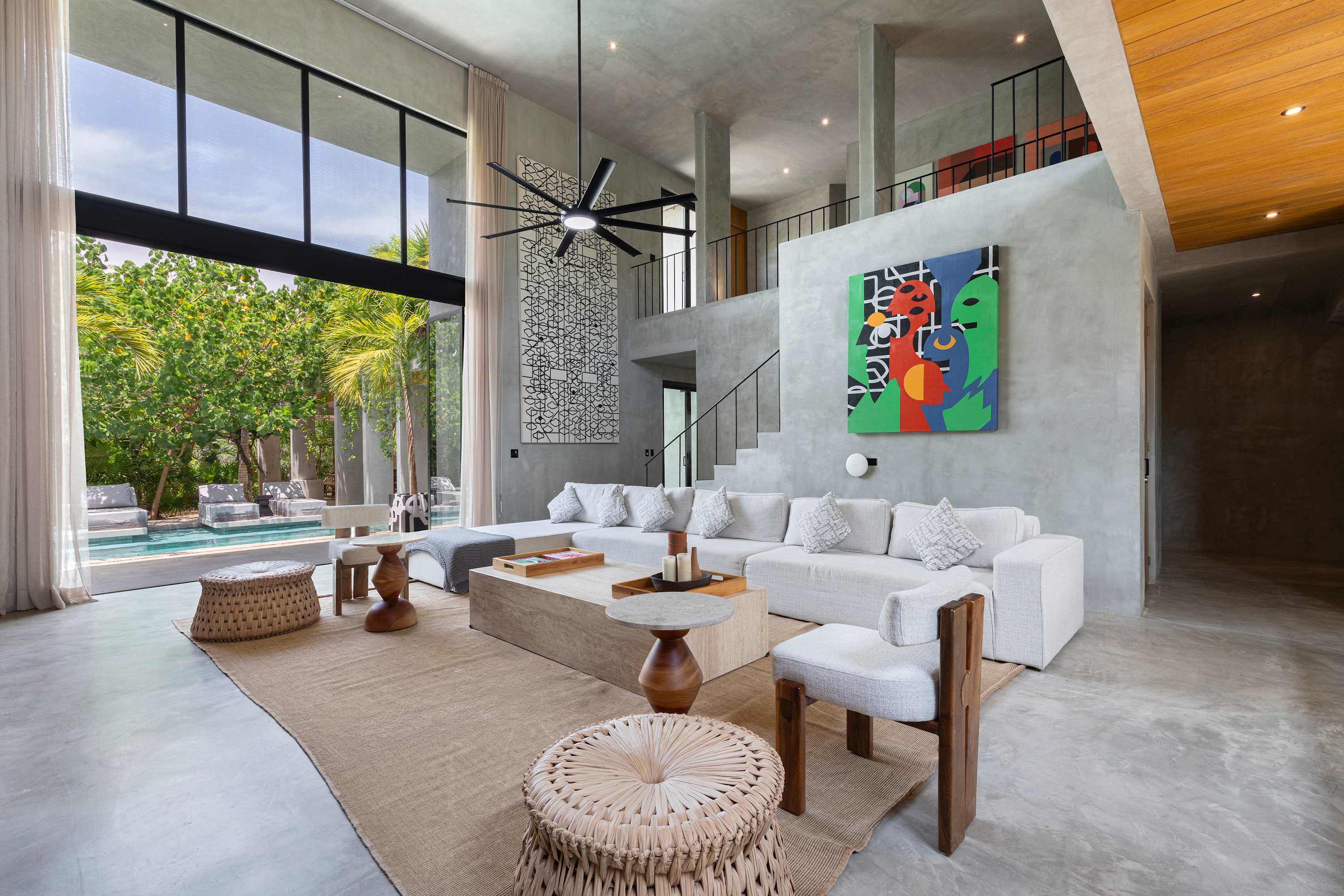 Expansive living room designed for both productivity and relaxation—ideal for working from home or socializing with friends.