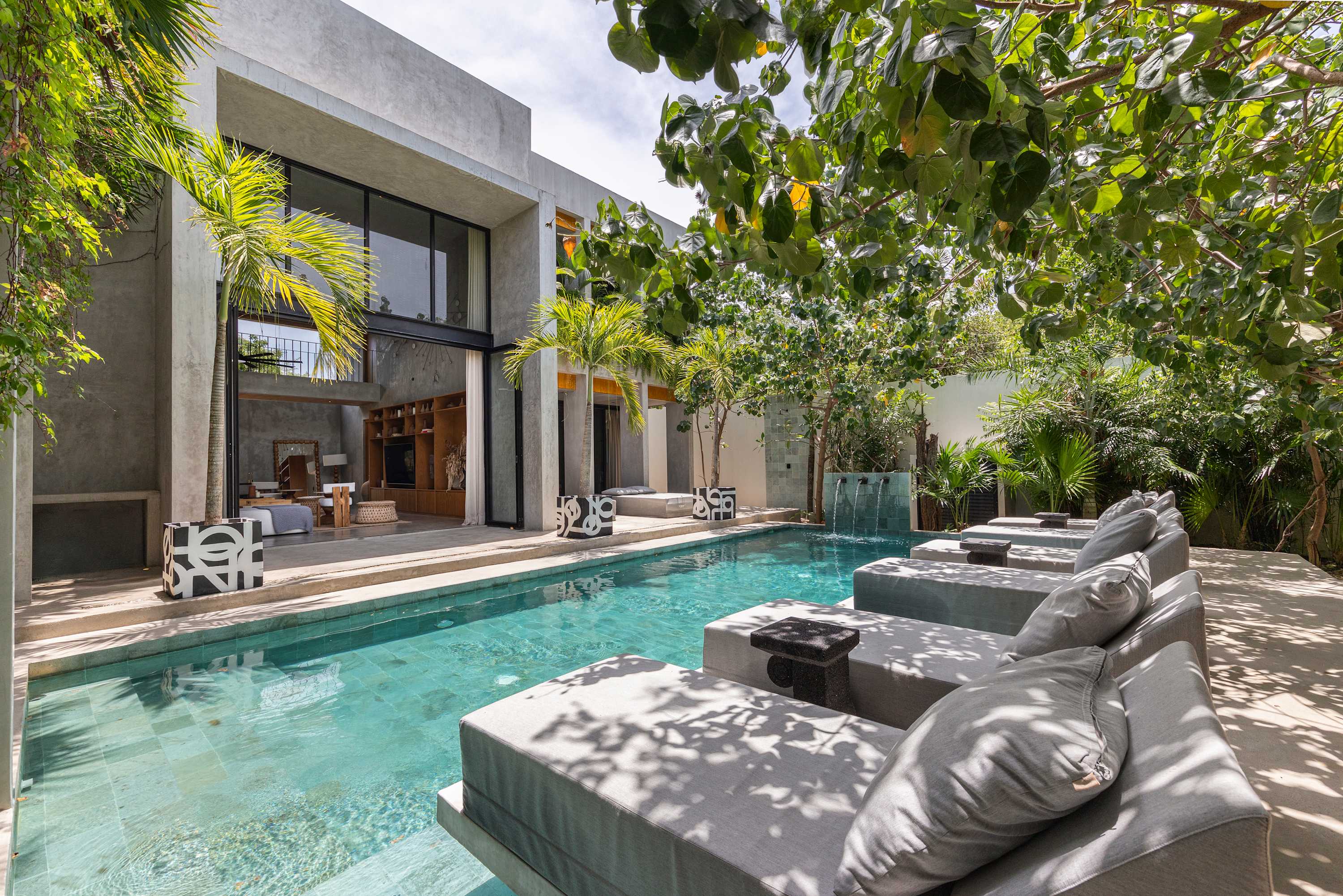 The pool area is designed for fun and relaxation