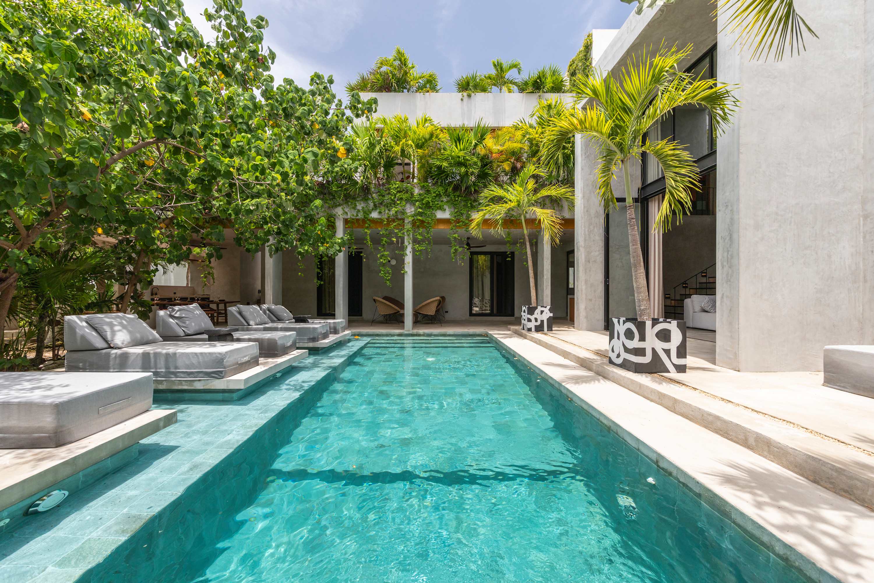 The pool area is designed for fun and relaxation