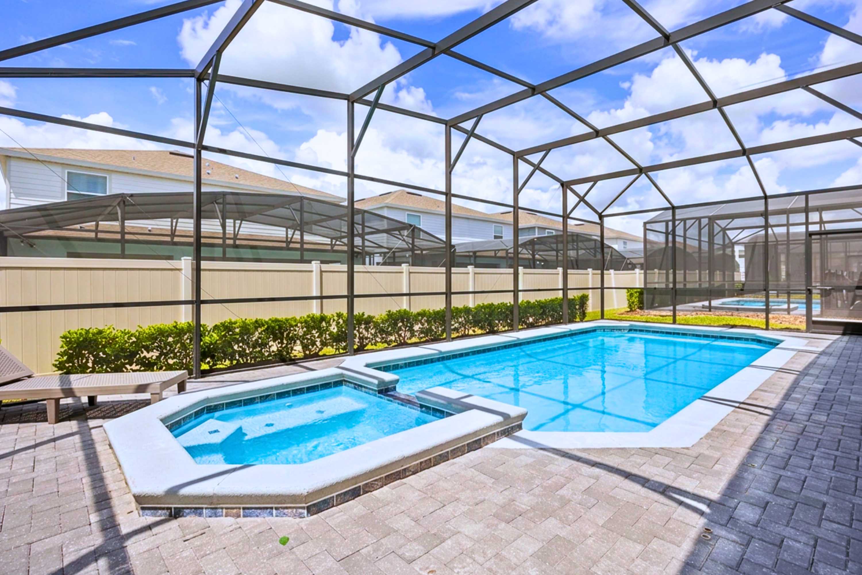 Private screened-in swimming pool and hot tub 